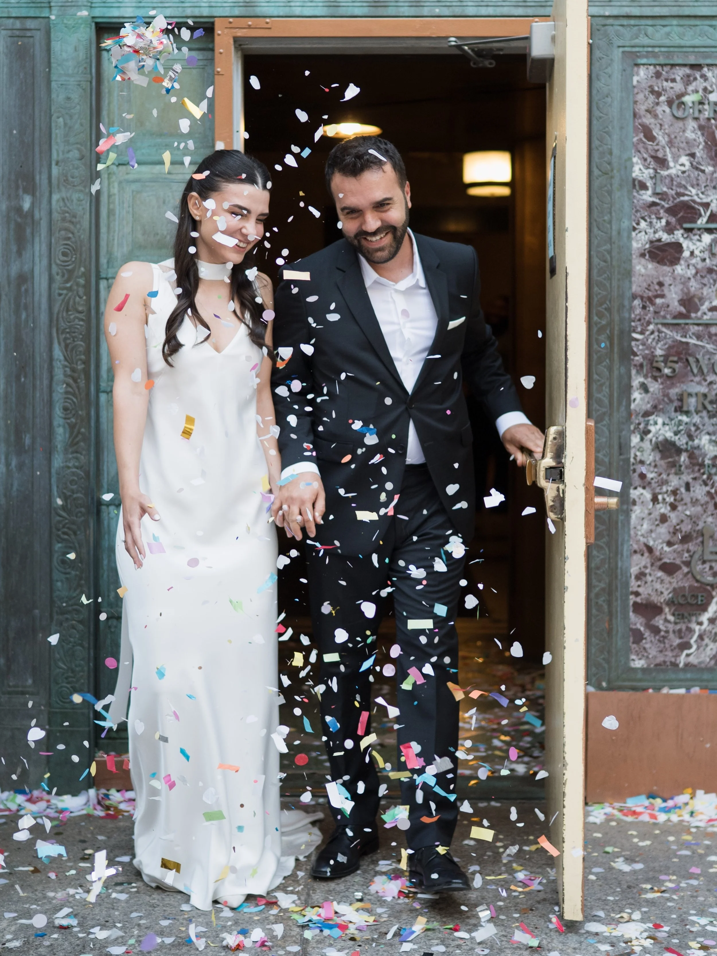 Michal was fixing Itay&rsquo;s suit when their number flashed on the screen.

A second of panic, then a laugh, then a walk into the chapel holding hands. Five minutes later they were married.

That&rsquo;s a City Hall wedding for you: short, a little
