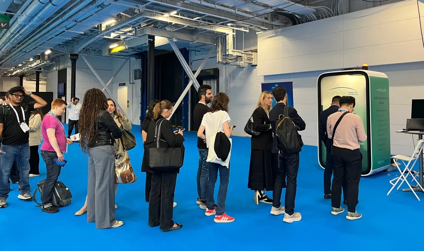 people waiting for hours to try the MedicubeX eHealth Station™ at London Tech Week 2024