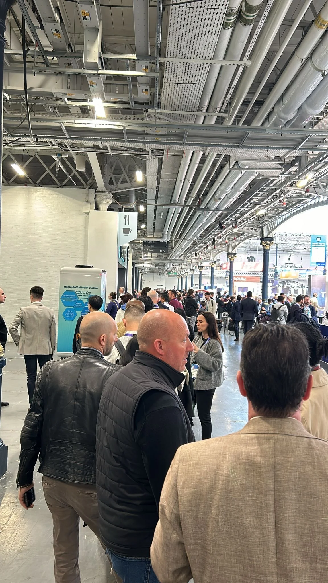 people waiting for hours to try the MedicubeX eHealth Station™ at London Tech Week 2025