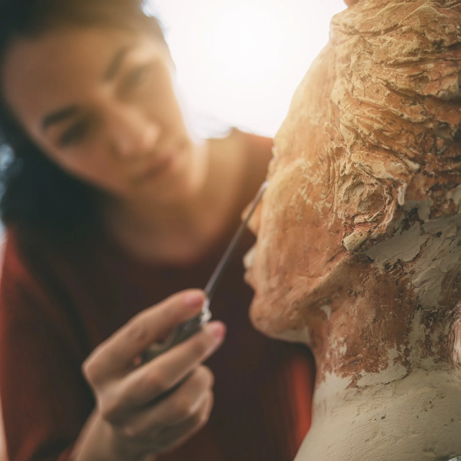 Woman sculpting