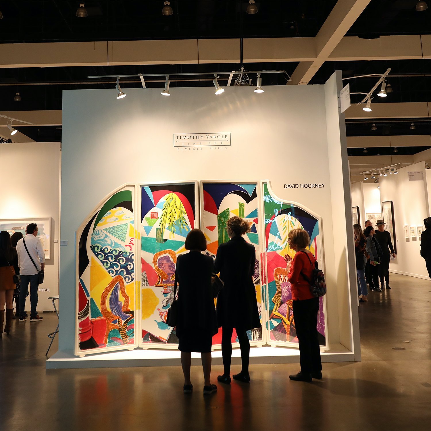 Group looking at an art display
