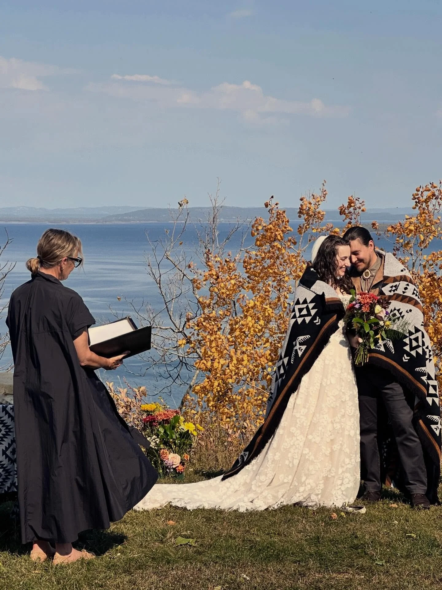 This elopement on Manitoulin Island, perched high overlooking the lake, is one that I will carry with me.  Infused with First Nations traditions including a blanket ceremony, and held by a fire started with sage - it was beautiful and sacred.  That I