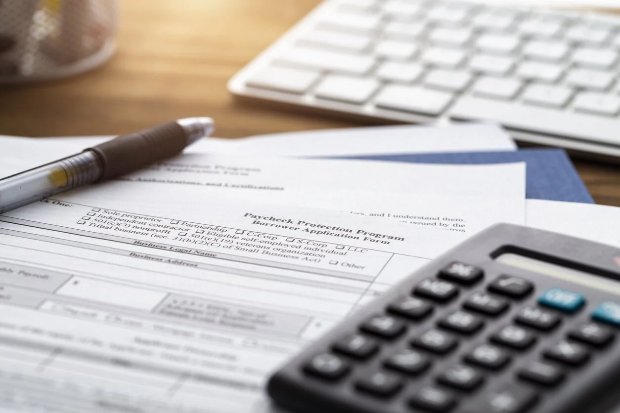 Two Individuals Charged with Fraudulently Seeking CARES Act Paycheck Protection Loans