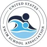 Circular blue and white logo signifying membership with the United States Swim Schools Association