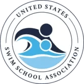 Circular blue and white logo signifying membership with the United States Swim Schools Association