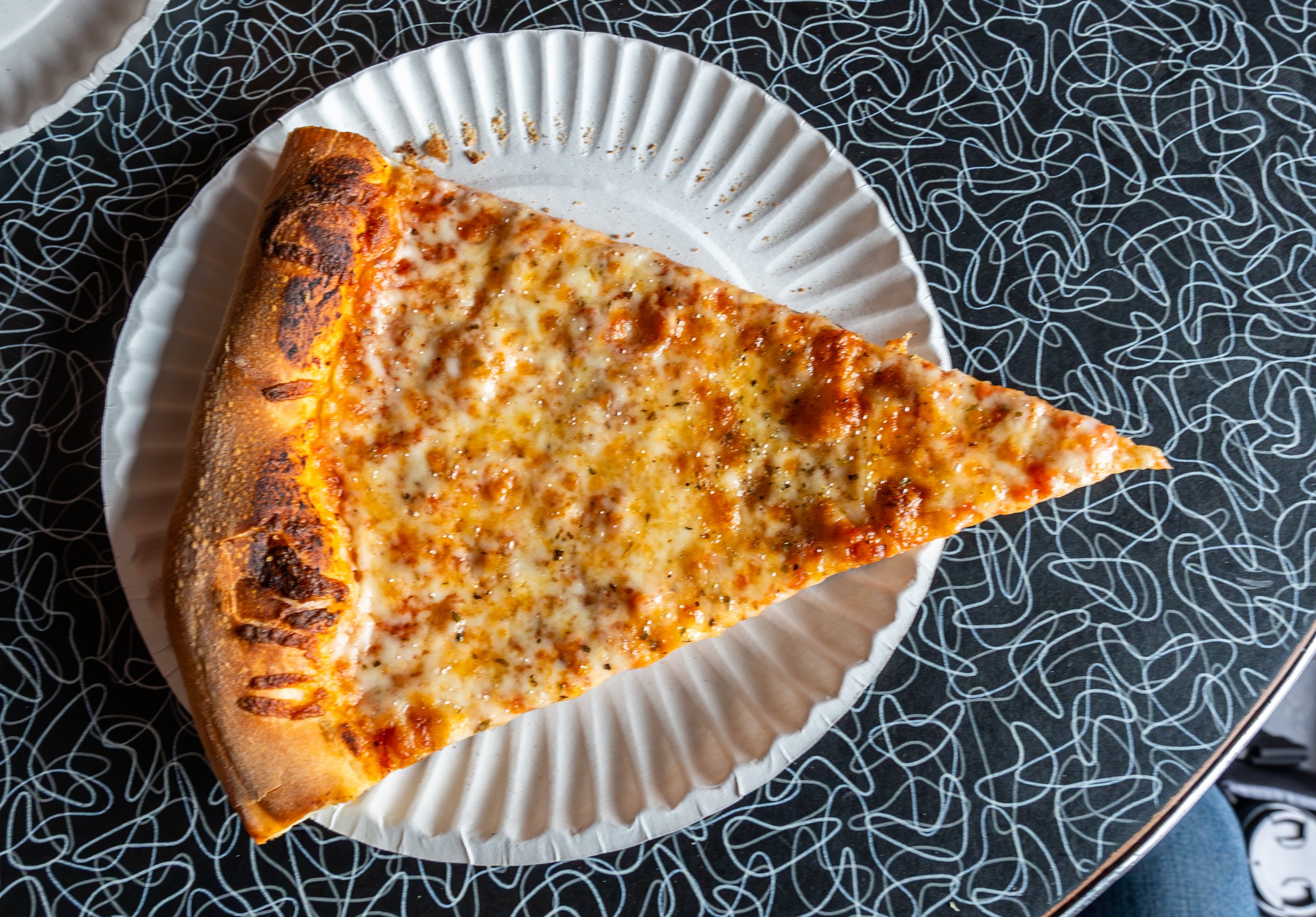 New York style pizza by the slice at Brooklyn Pizza Company on 4th Avenue in Tucson