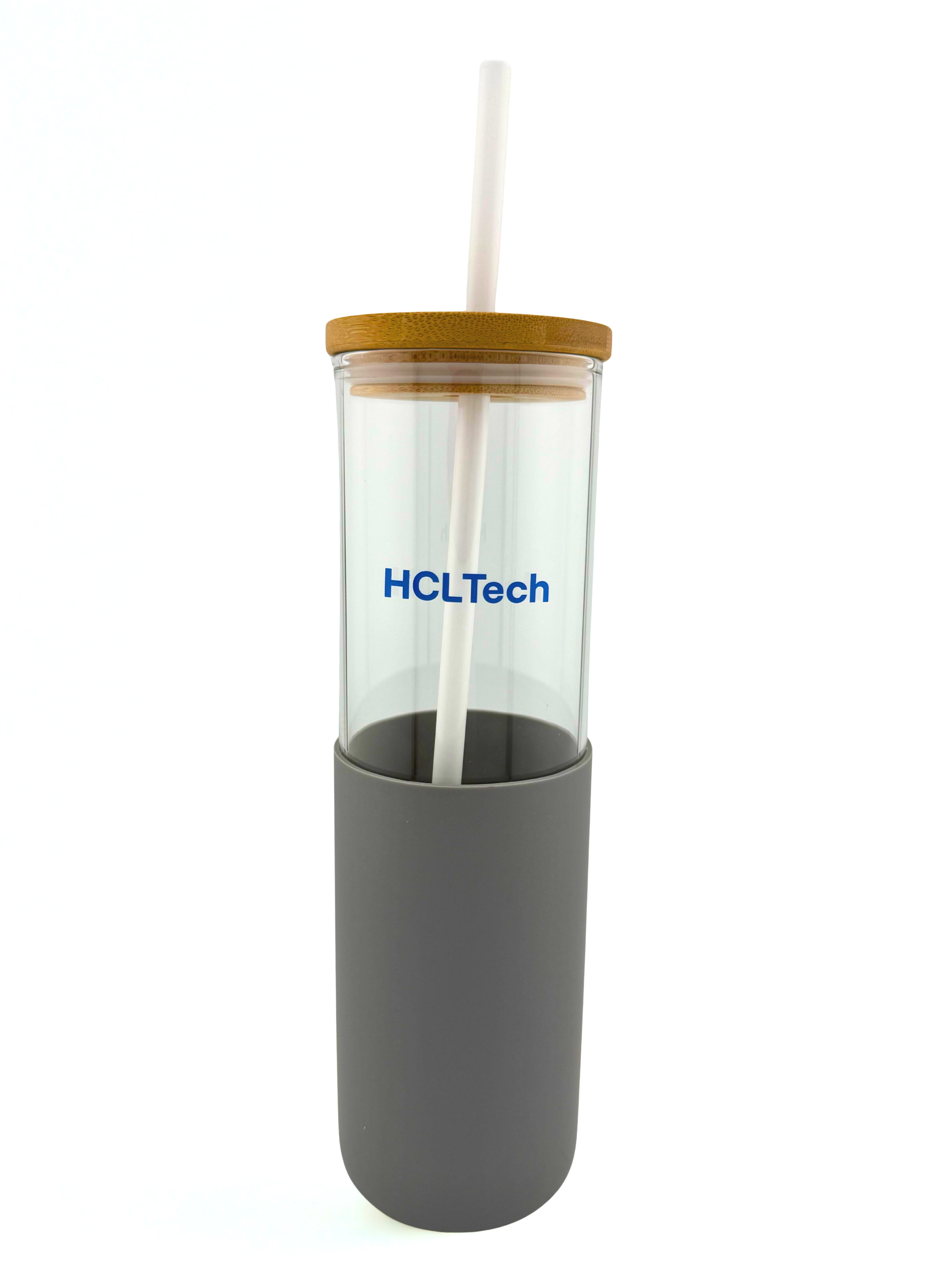 HCLTech we produced a sleek reusable tumbler featuring a clear glass body, warm bamboo lid, and soft-touch charcoal silicone sleeve. The minimalist one-color logo keeps the focus on form and function, giving their team and clients an elevated, eco-fo