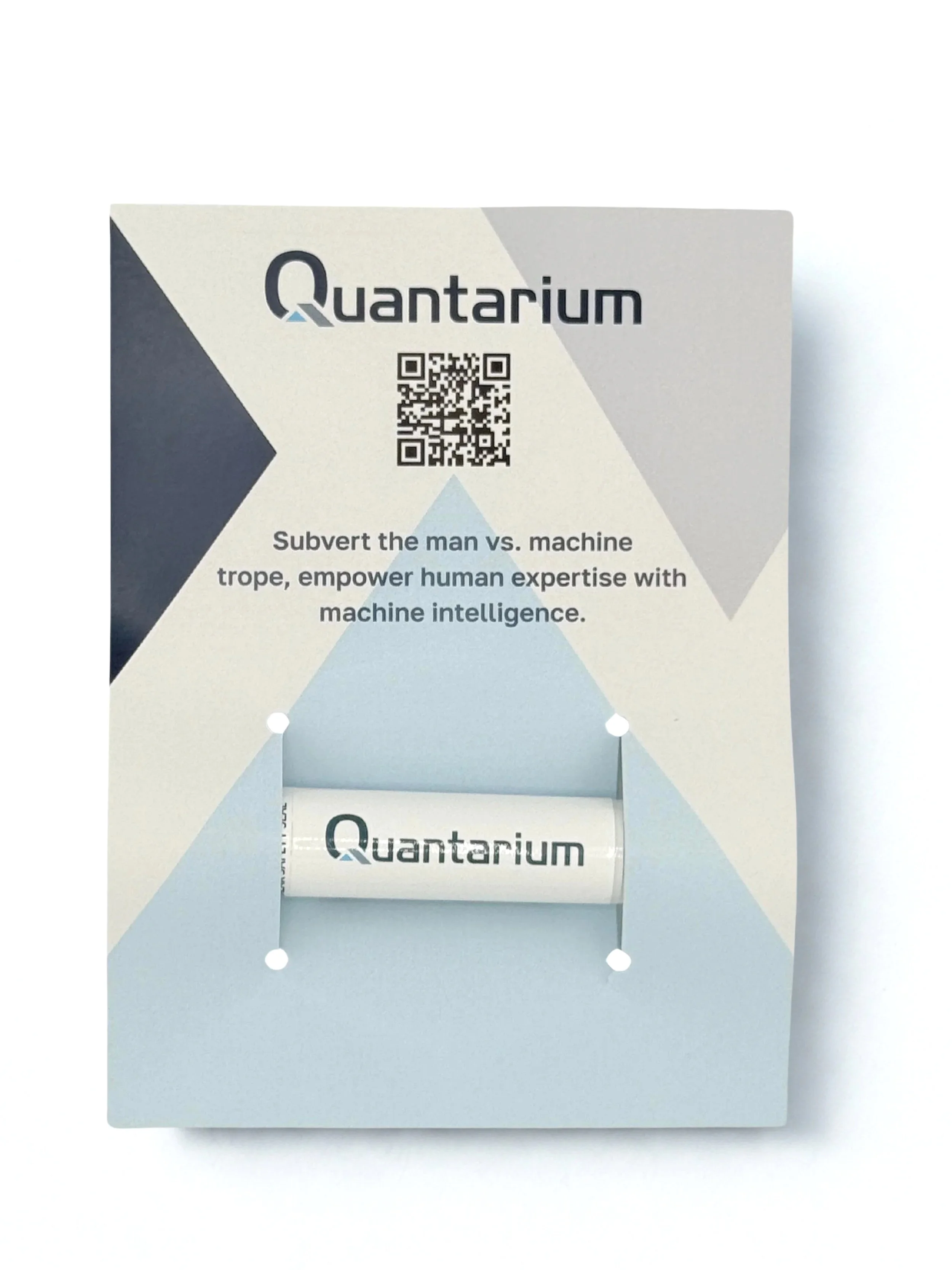 A custom Quantarium promotional card featuring a branded lip balm, QR code, and tagline. The sleek geometric design emphasizes the company’s mission: “Subvert the man vs. machine trope, empower human expertise with machine intelligence.”