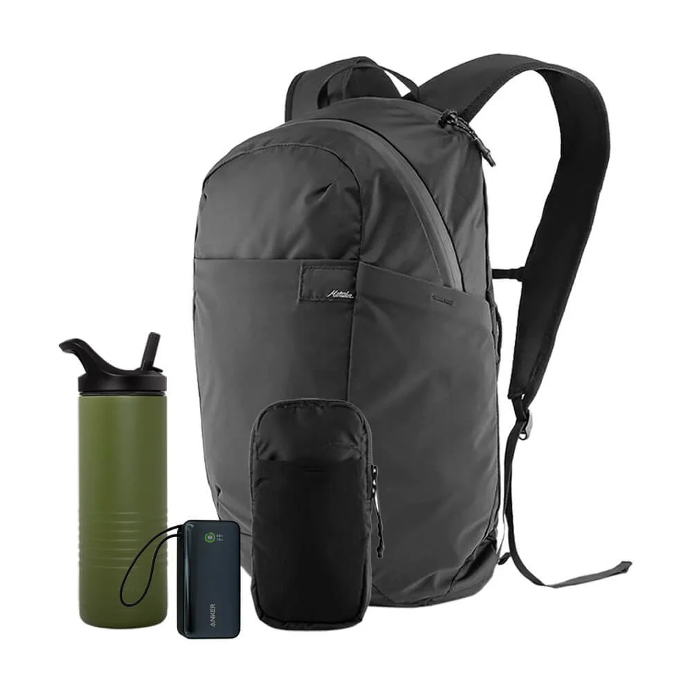 Matador packable backpack displayed with kit items beside it