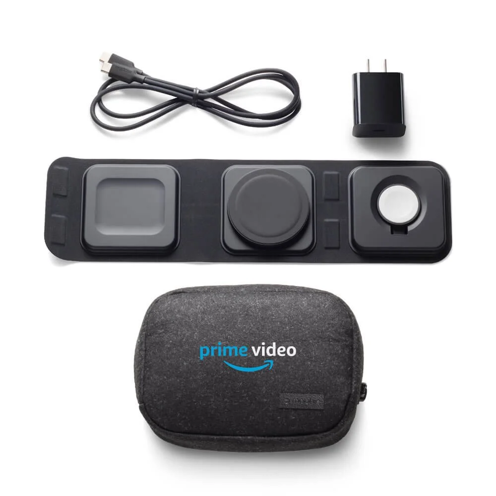 Mophie charger and accessories laid out next to travel pouch