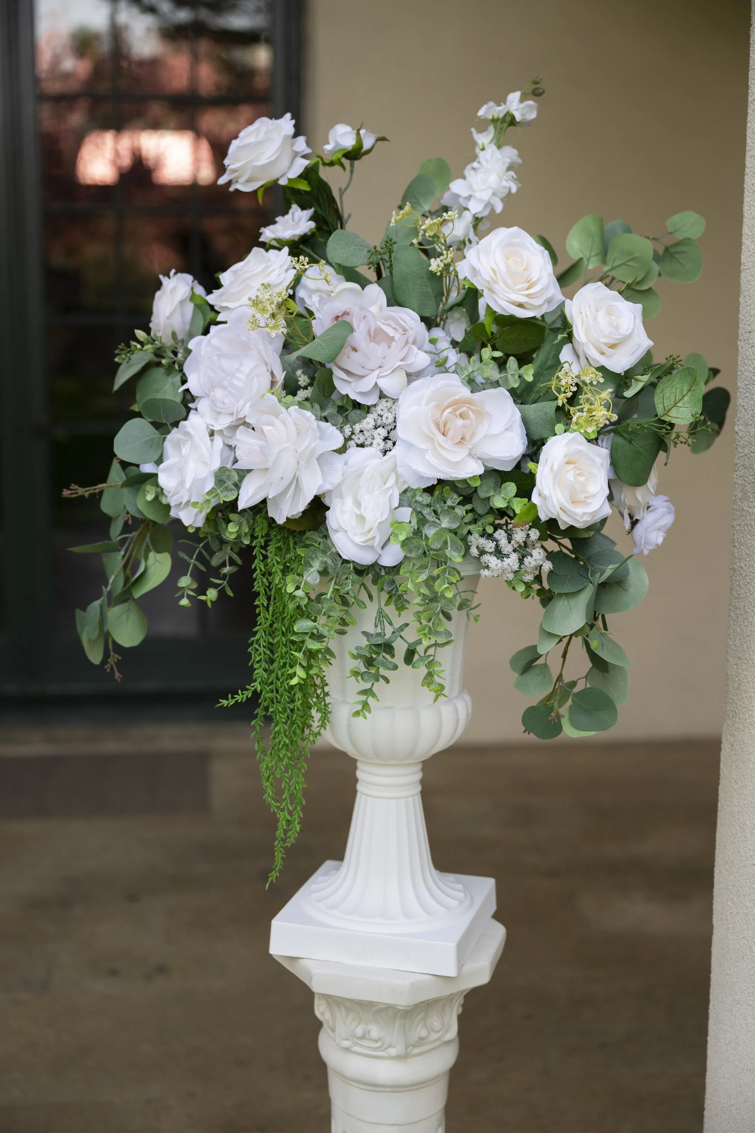wedding faux floral arrangment in pedestal.JPG