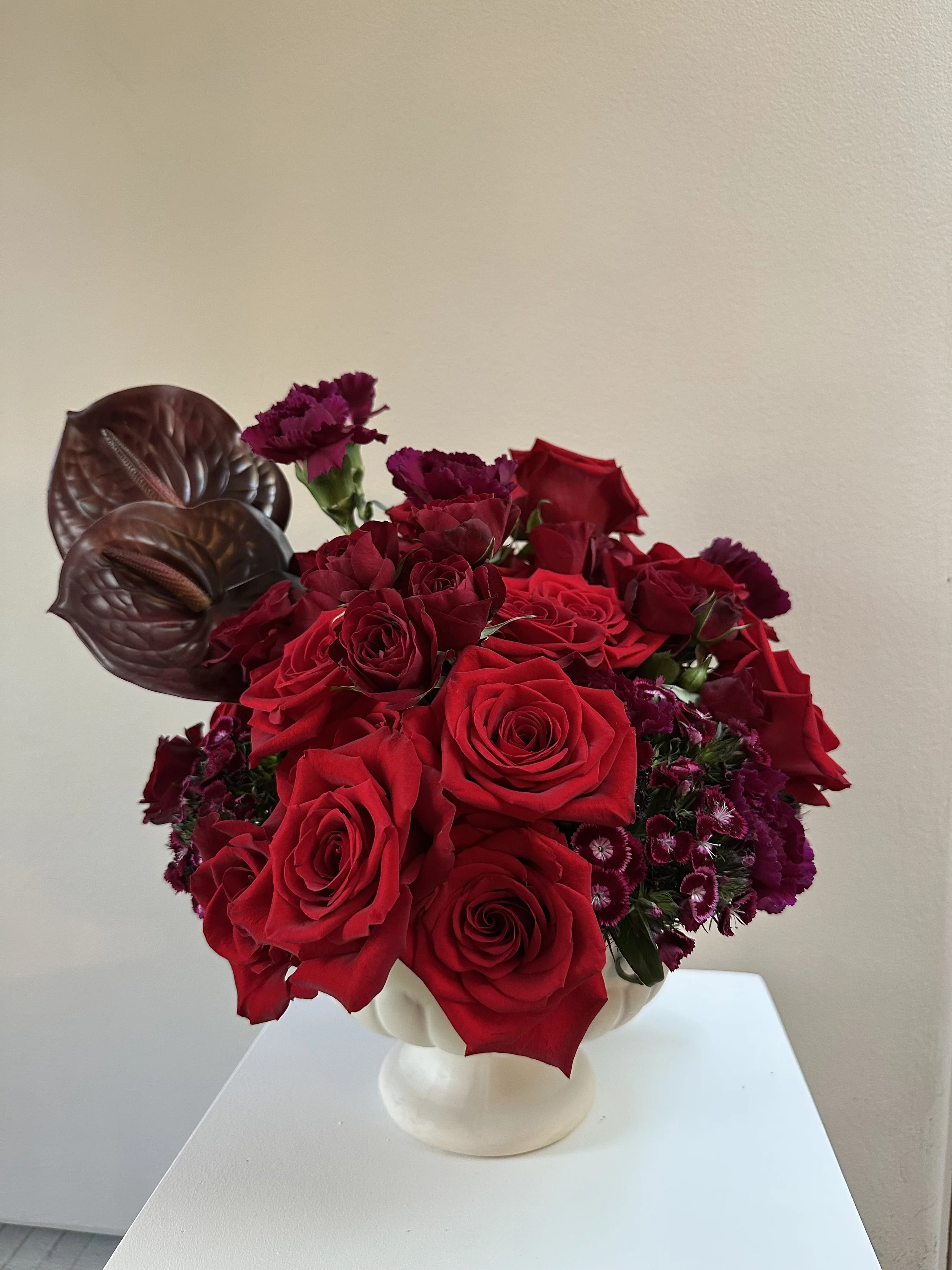 red rose flower arrangement.jpeg