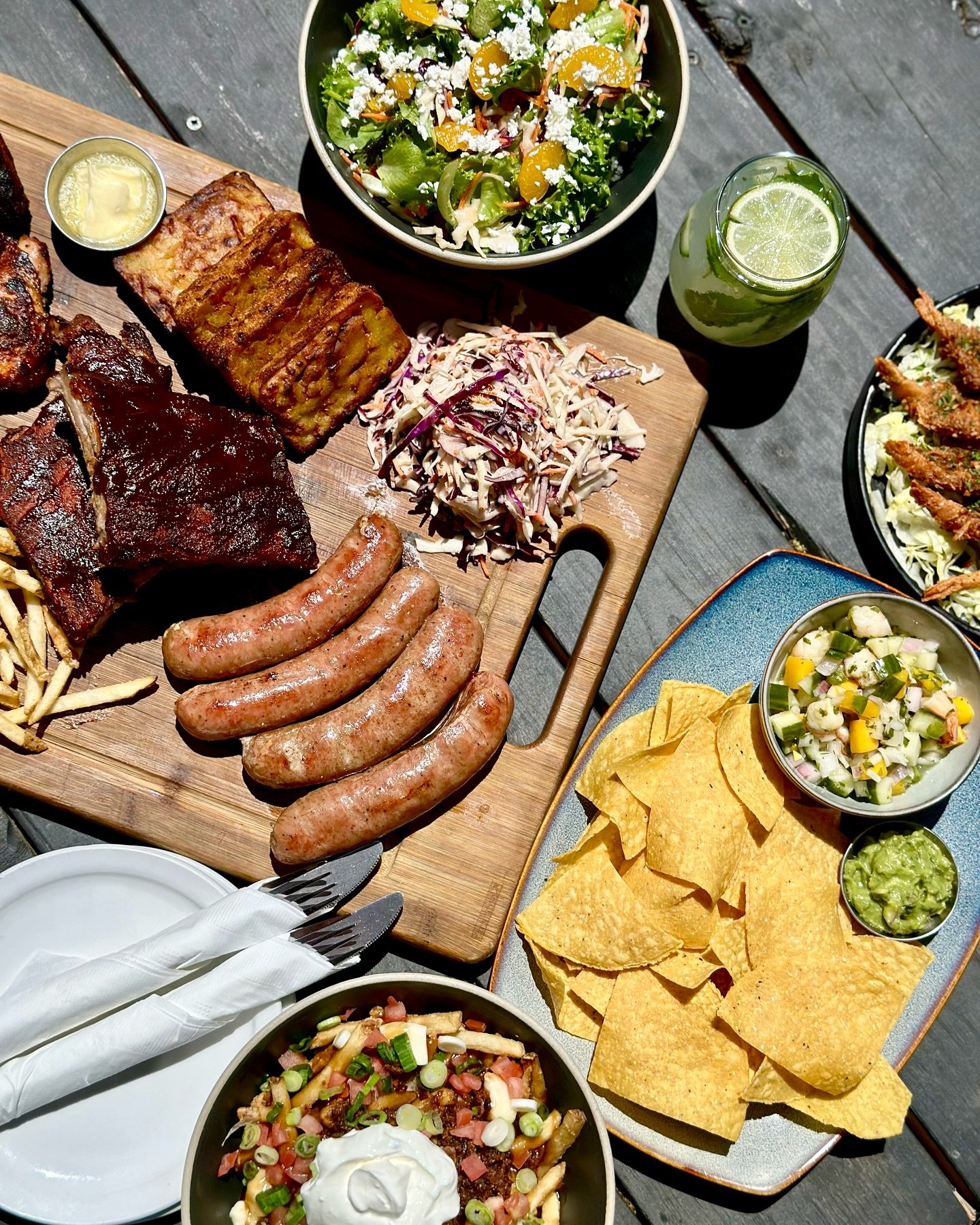 Summer is here and so is our new menu! ☀️

Here&rsquo;s what we&rsquo;ve got for ya:

1. Smoked BBQ platter for four 🍗
2. Mandarin Salad 🥗
3. Coconut Shrimp 🍤
4. Shrimp &amp; Mango Ceviche 🥭
5. Loaded Poutine 🍟

Which one are you trying first?