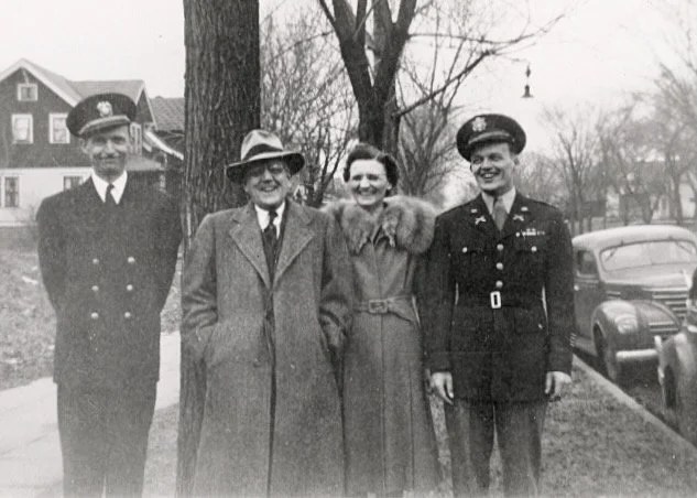 Irving and Hazel with their sons Bob and Jim in uniform, abt 1942