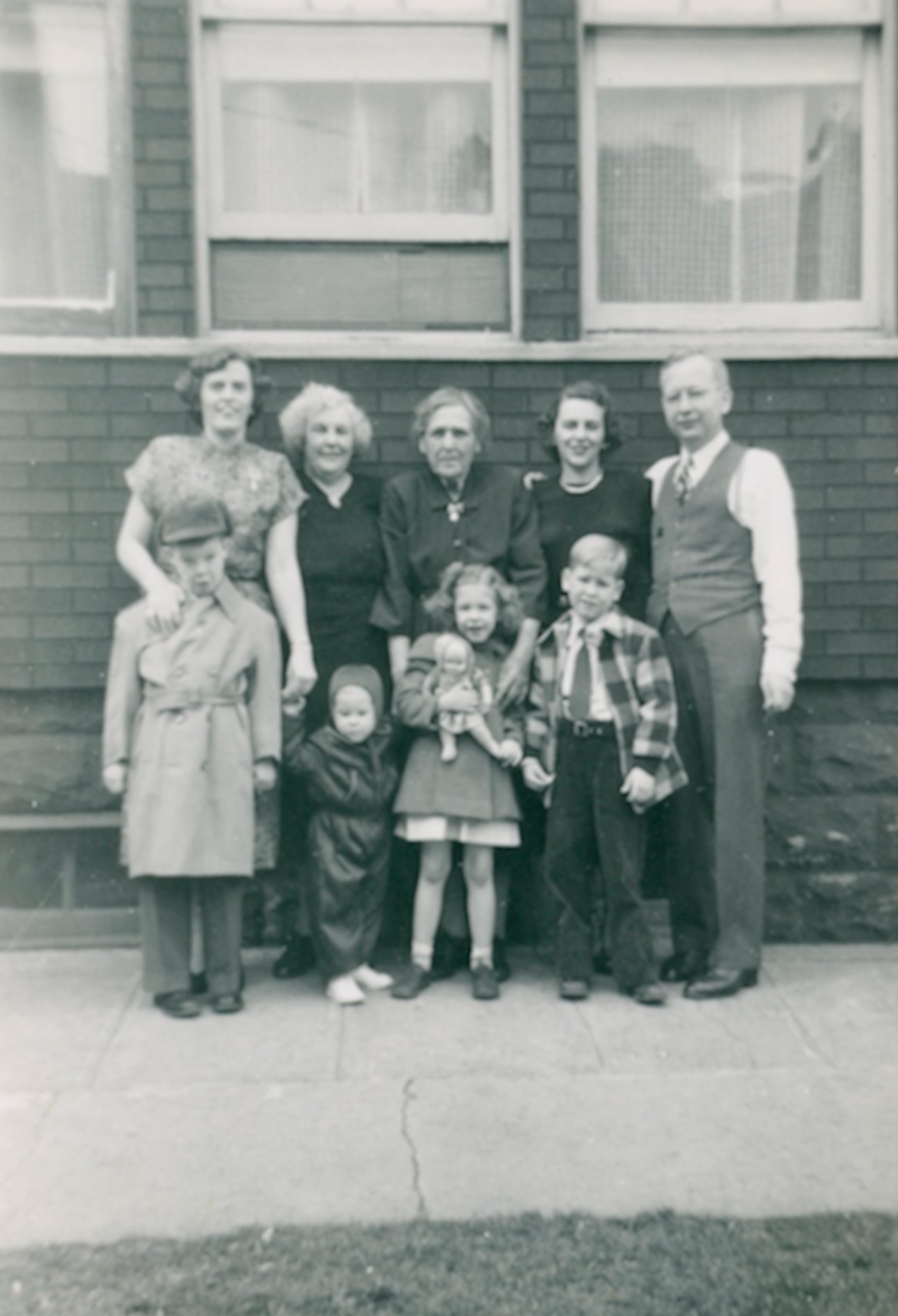 The family - front: Bruce and Brian Koehn, Alice and Leonard Romanker - back: Aunt Rita Koehn, Libby Schmidt Koehn, Aunt Dorothea Schmidt, Mildred and Frank Romanker - Apr 1950