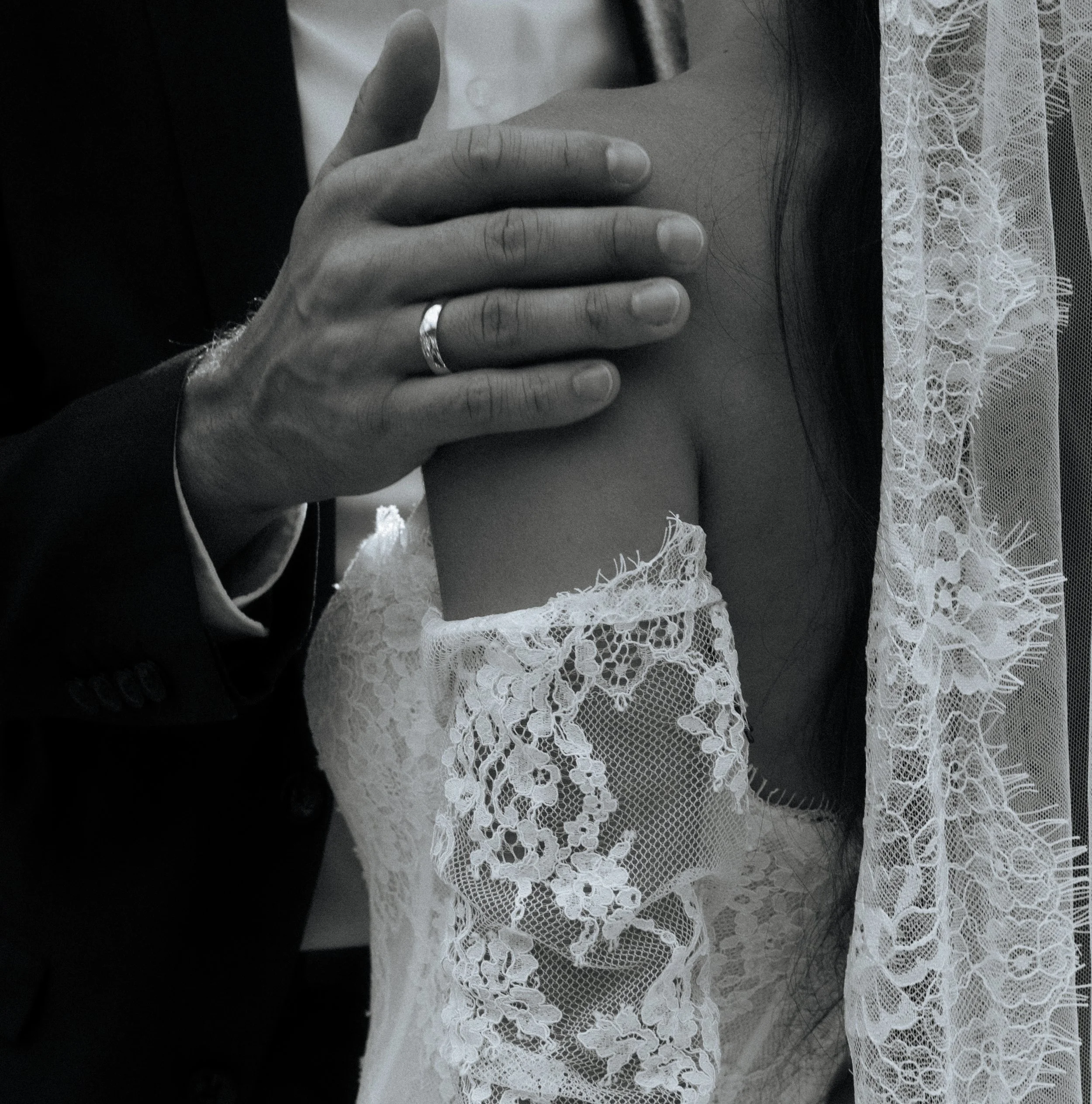 Groom caressing brides shoulder during Switzerland Adventure Elopement