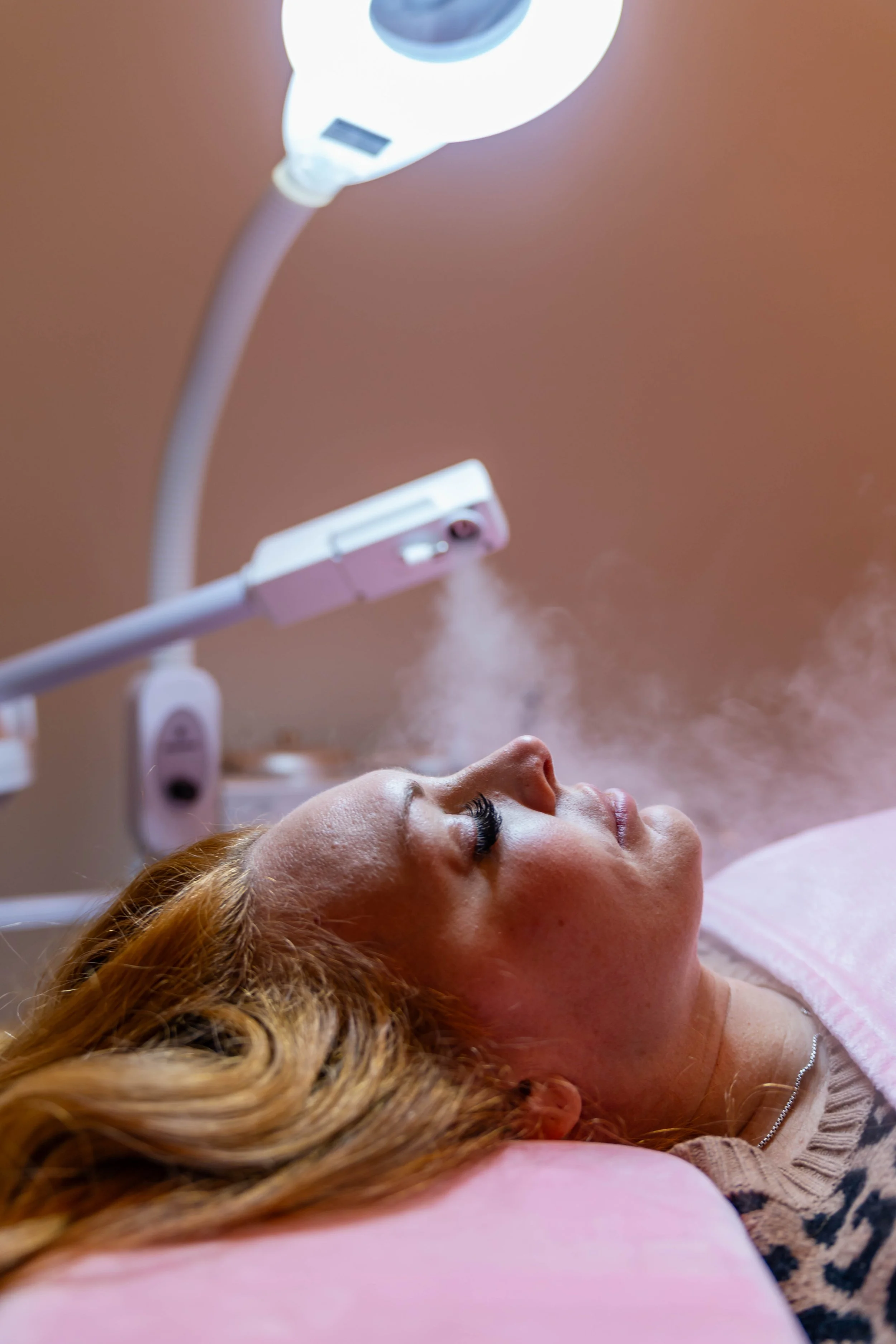 Relaxing facial treatment at GROW Salon & Spa in Brookside Kansas City