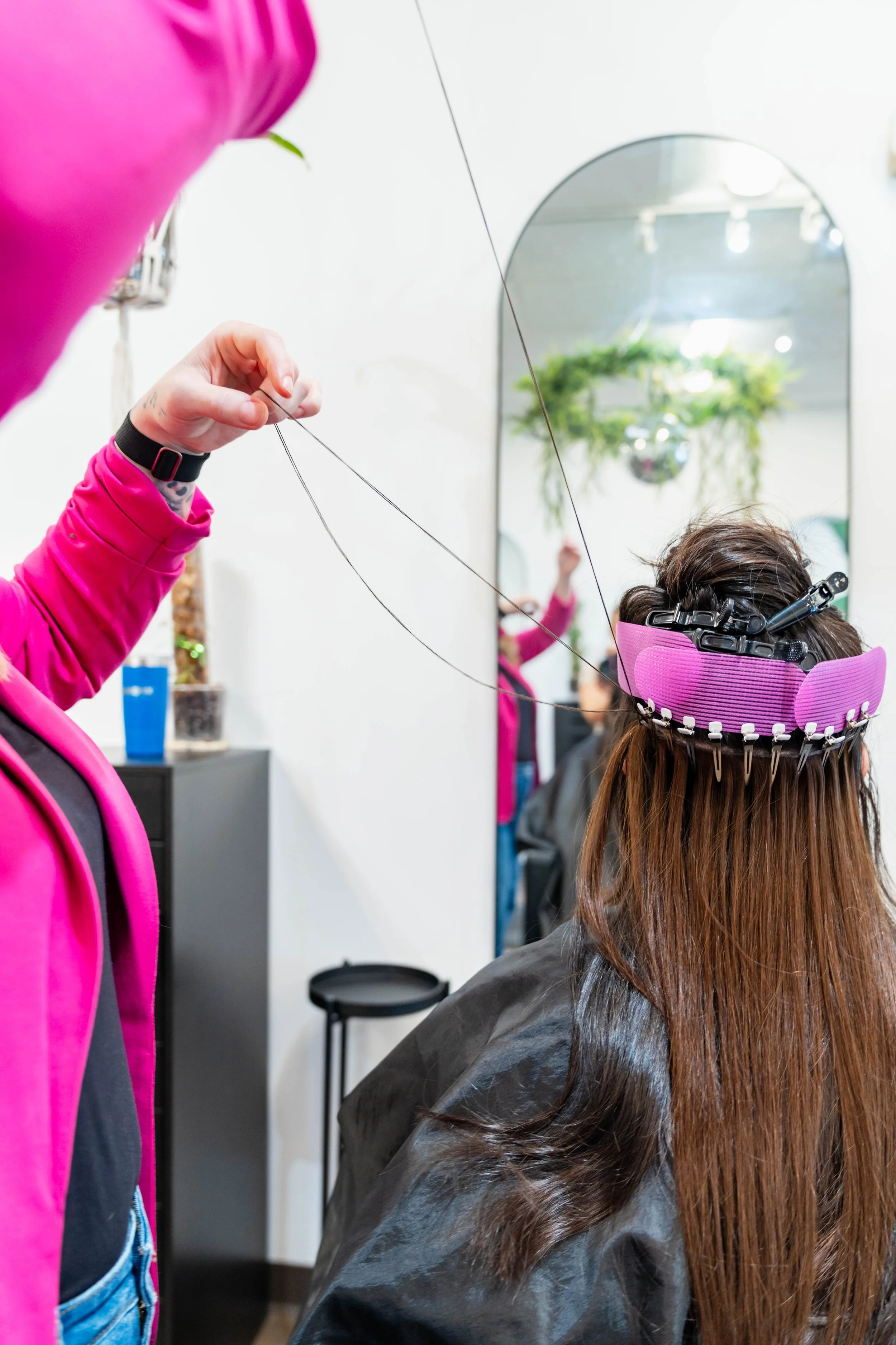Hair extension installation at GROW Salon & Spa in Brookside Kansas City