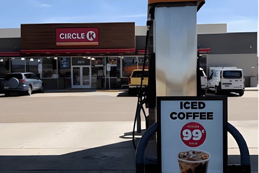 A Circle K convenience store and gas station with a sign advertising iced coffee for 99 cents in the foreground.