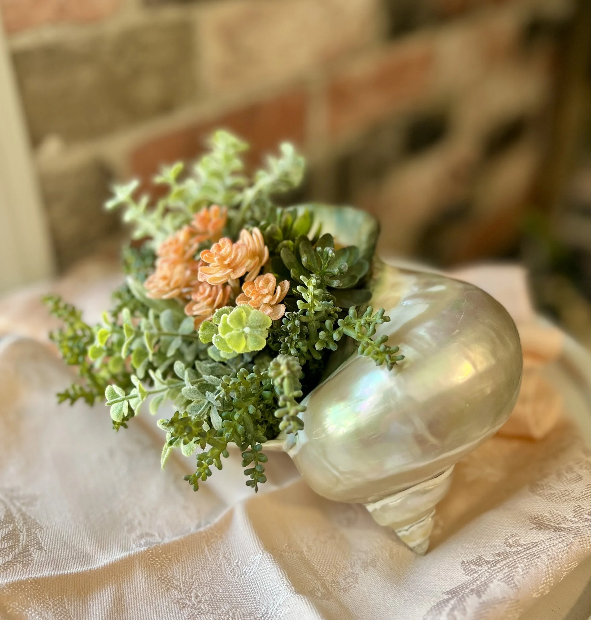Custom design in owner's conch shell