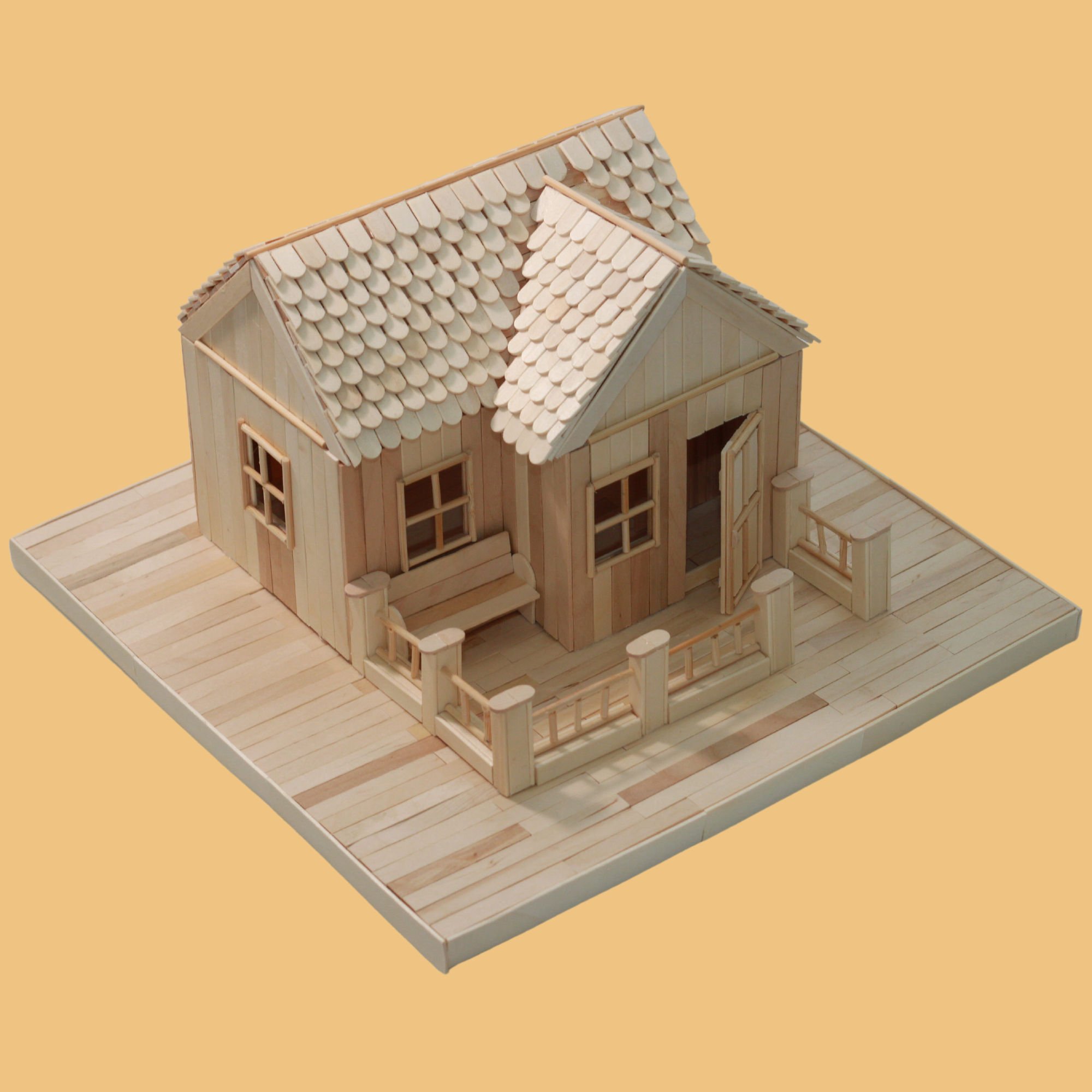 Angle view of a popsicle stick model, "Home Sweet Home," created Popsi Kits. Product image.
