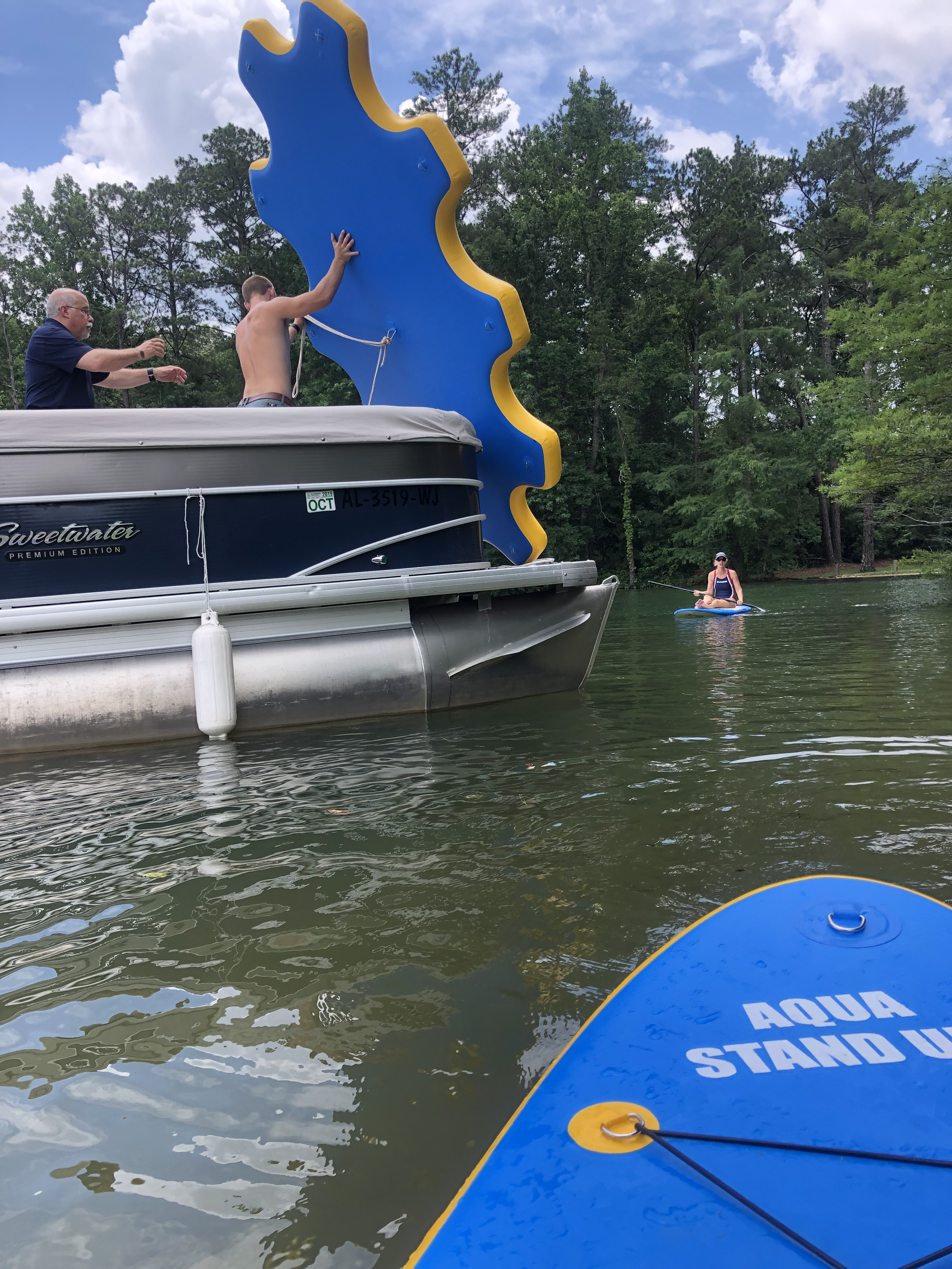 set up an inflatable aquastandup platform on a lake for an aquastandup class