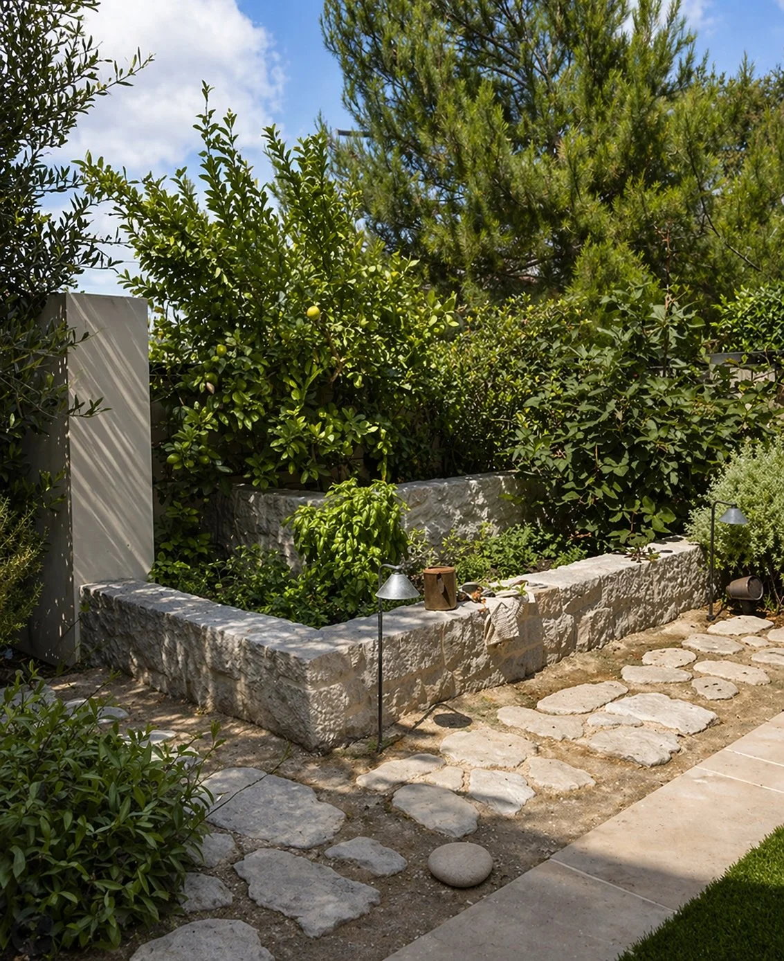 Brett-Ryan-Pools_Orange-County_Hardscape_Limestone Veneer, tiered planters_4-22.jpg