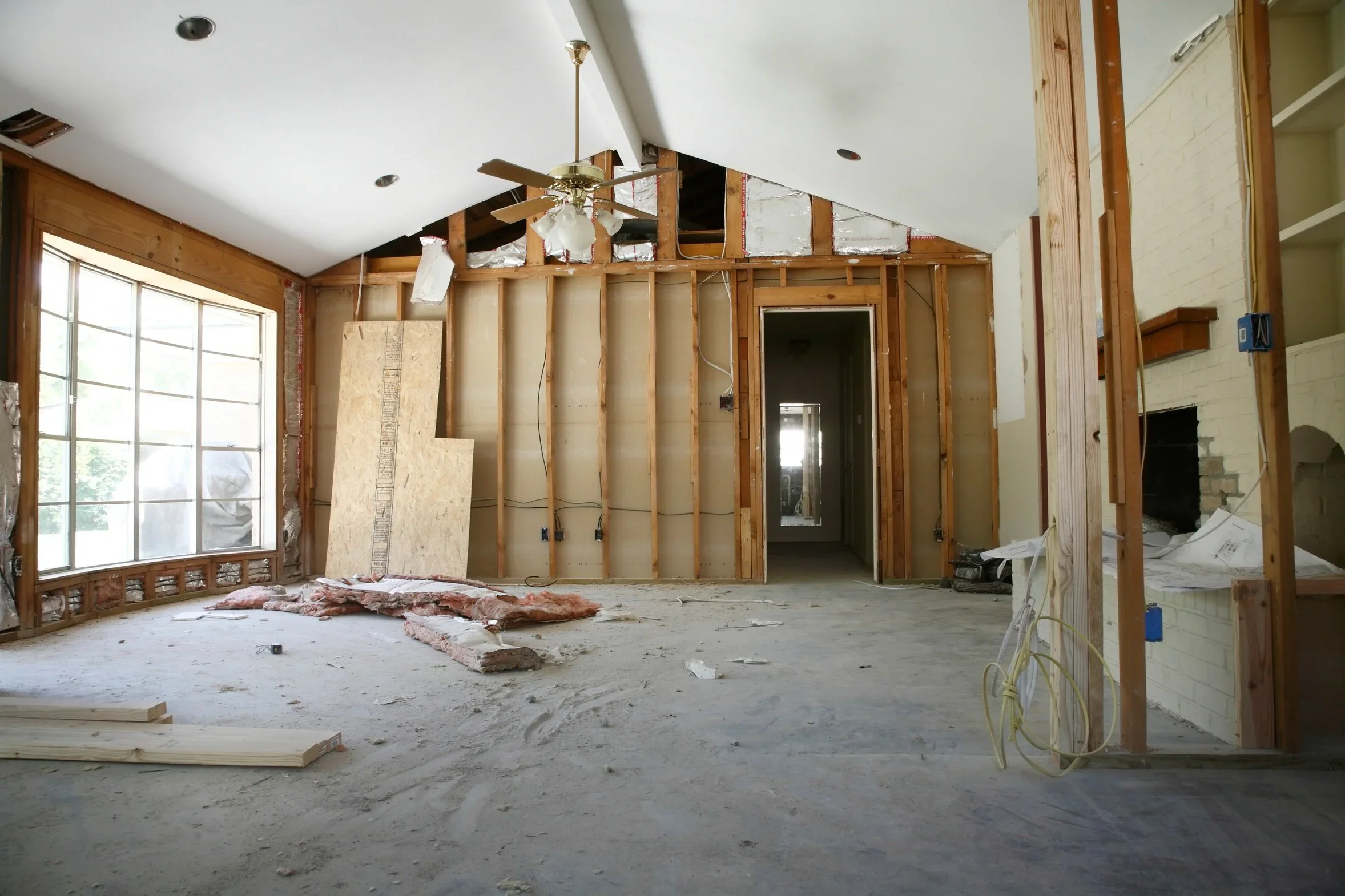 Interior of a house under renovation with new wall framing