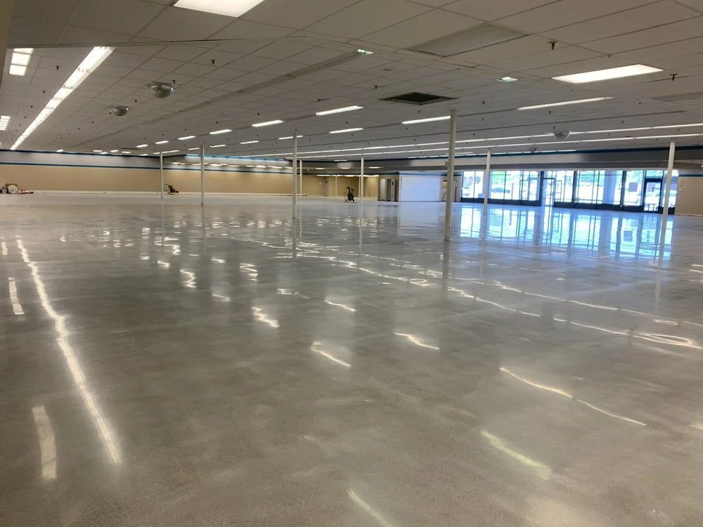 Polished concrete floor in a 20,000 sq ft commercial retail space by J&G Epoxy Coatings