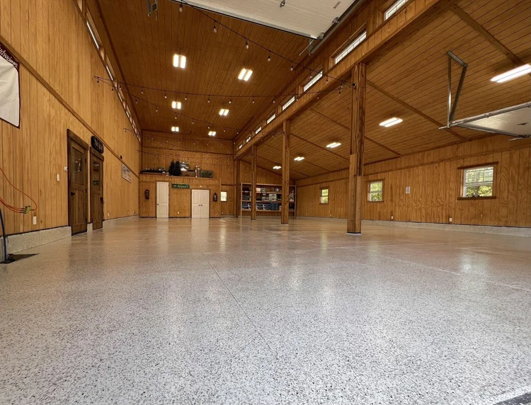 Flake floor in a wood-lined pole barn