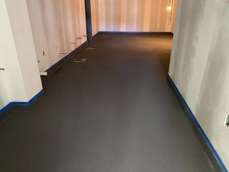 Charcoal coated basement floor