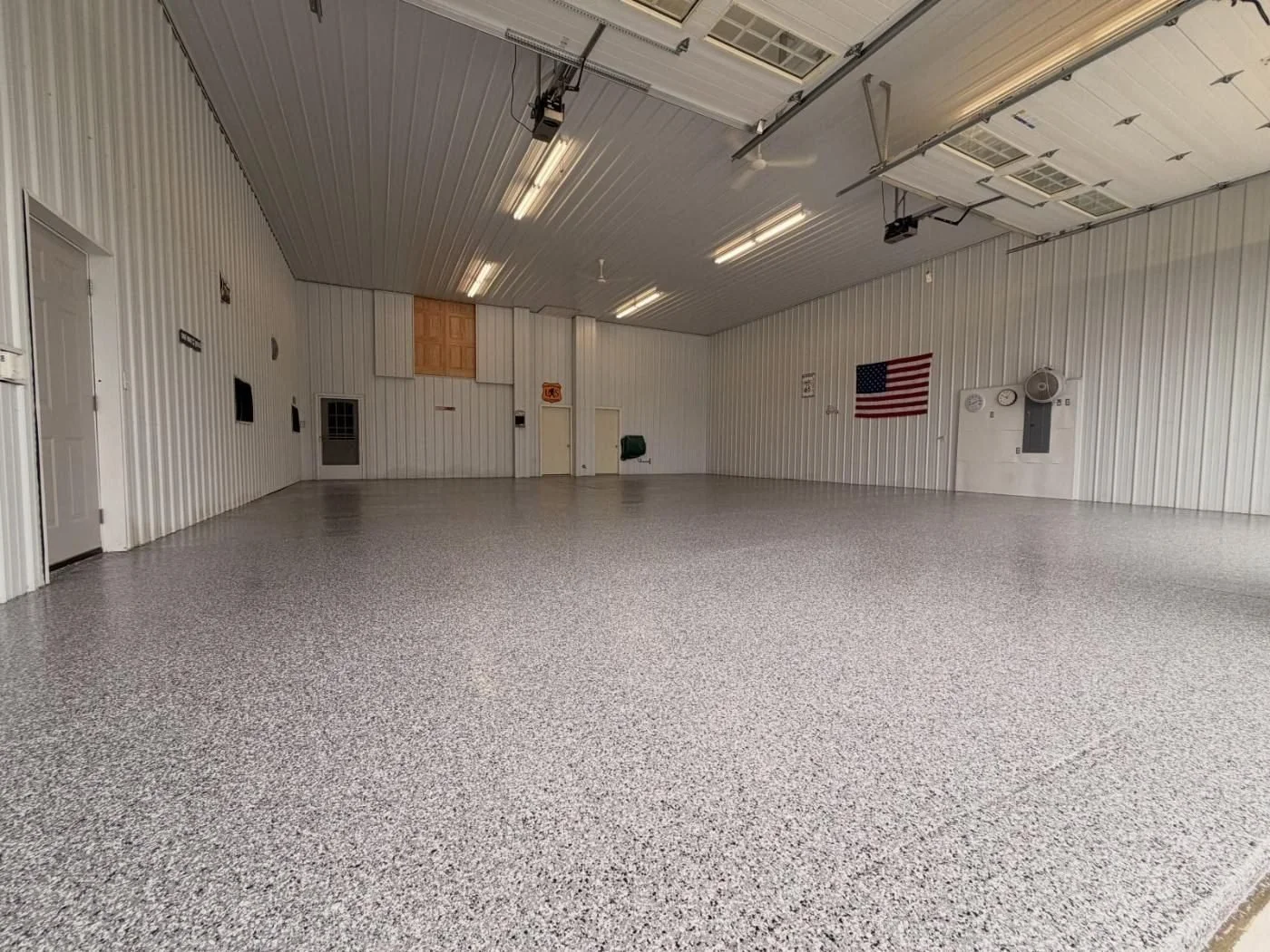 Finished flake epoxy floor in a pole barn garage, central Ohio, by J&G Epoxy Coatings
