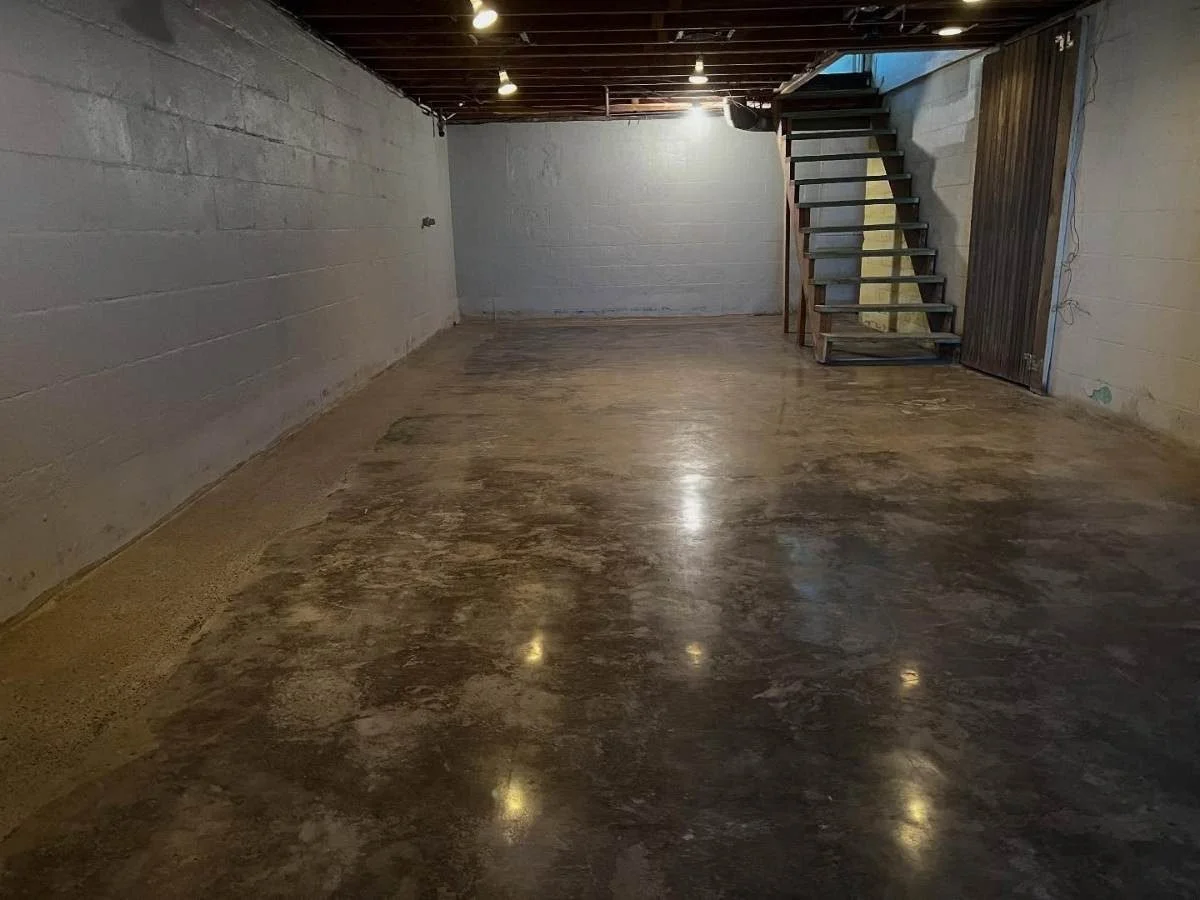 Stained and sealed concrete basement floor by J&G Epoxy Coatings, central Ohio
