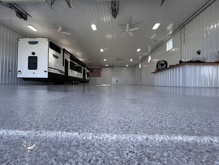 Full-broadcast flake floor with polyaspartic topcoat, close up