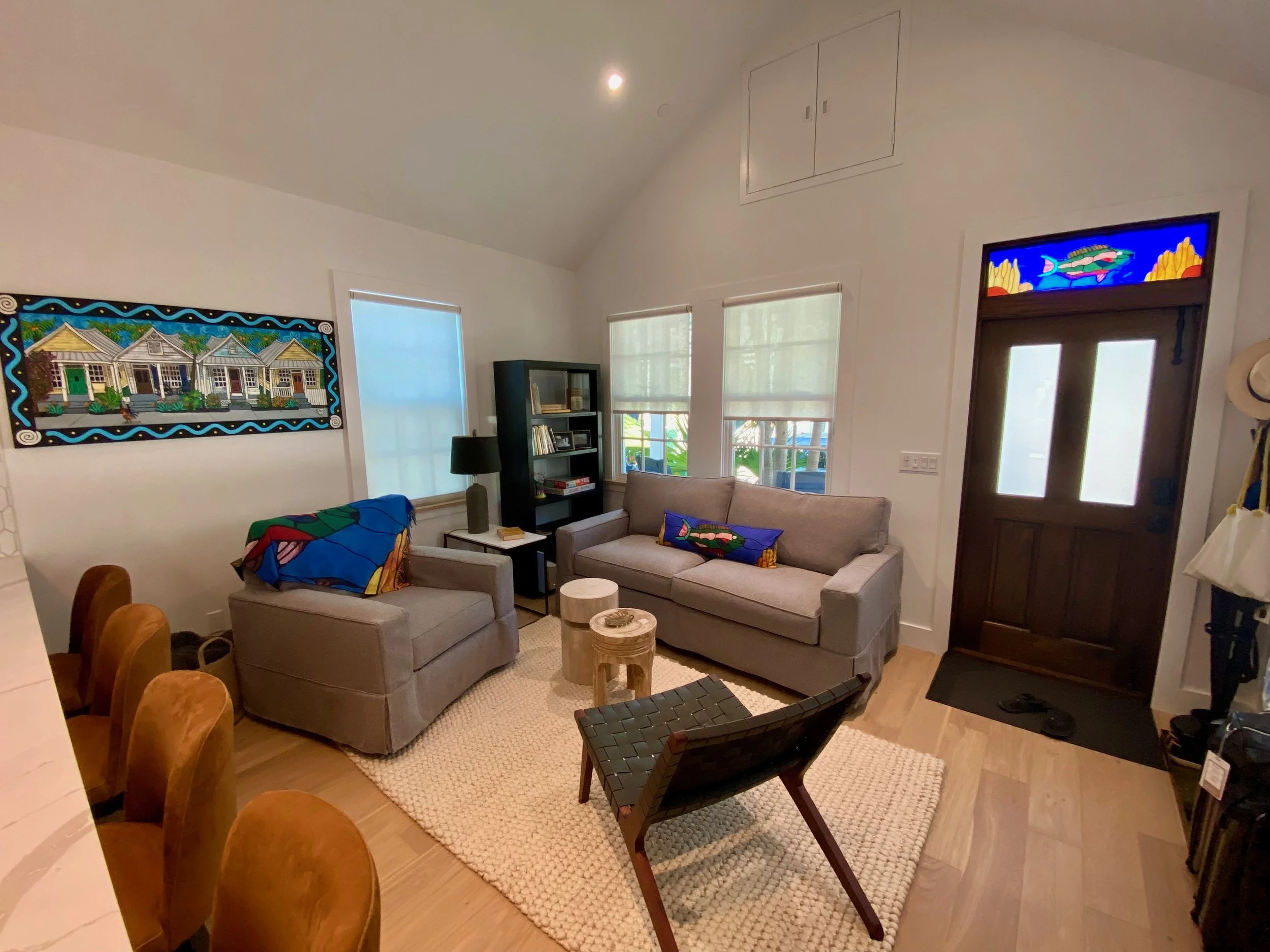 Utilizing the original door transom stained glass with an inset LED backlight to reuse historical materials creates lasting significance. 