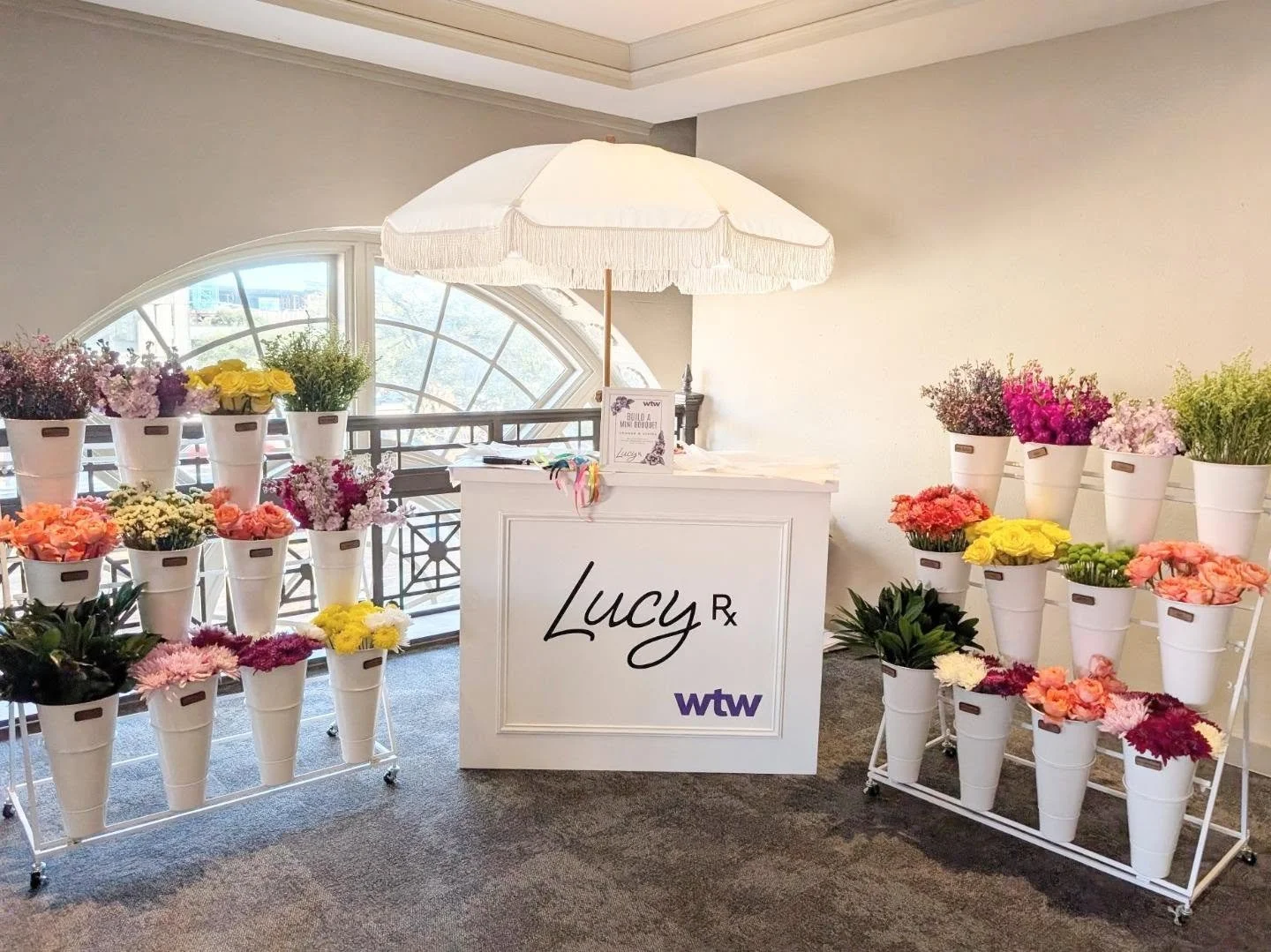 This bouquet bar wasn't just about the flowers, it was about giving guests a moment to create, connect and walk away with something that was their own. 

A bright, vibrant experience that turned a vendor showcase into an opportunity to have some fun 