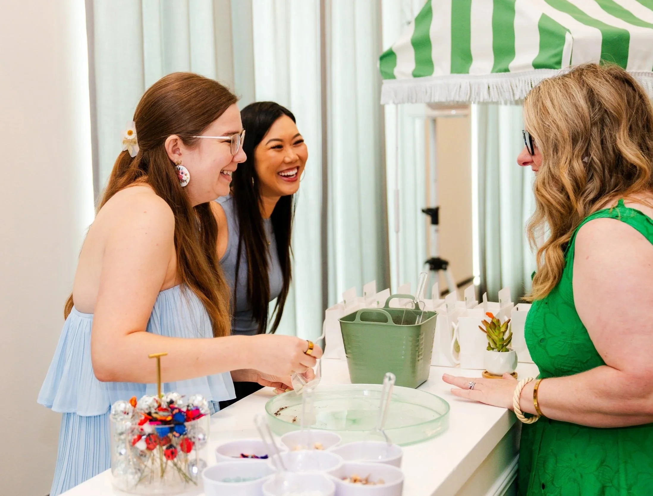 three women participating in succulent bar experience