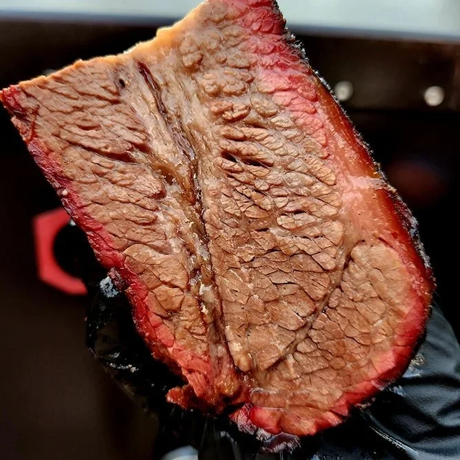 Close-up of a cooked slice of beef brisket.