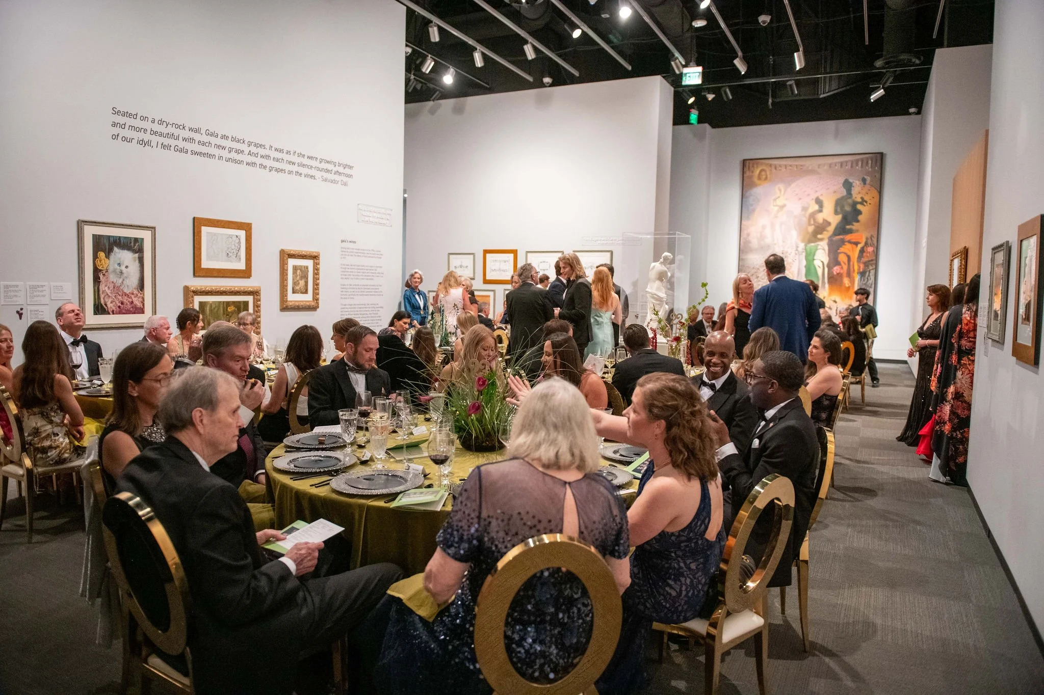 guests sitting at round tables inside the dali museum gallery for a gala