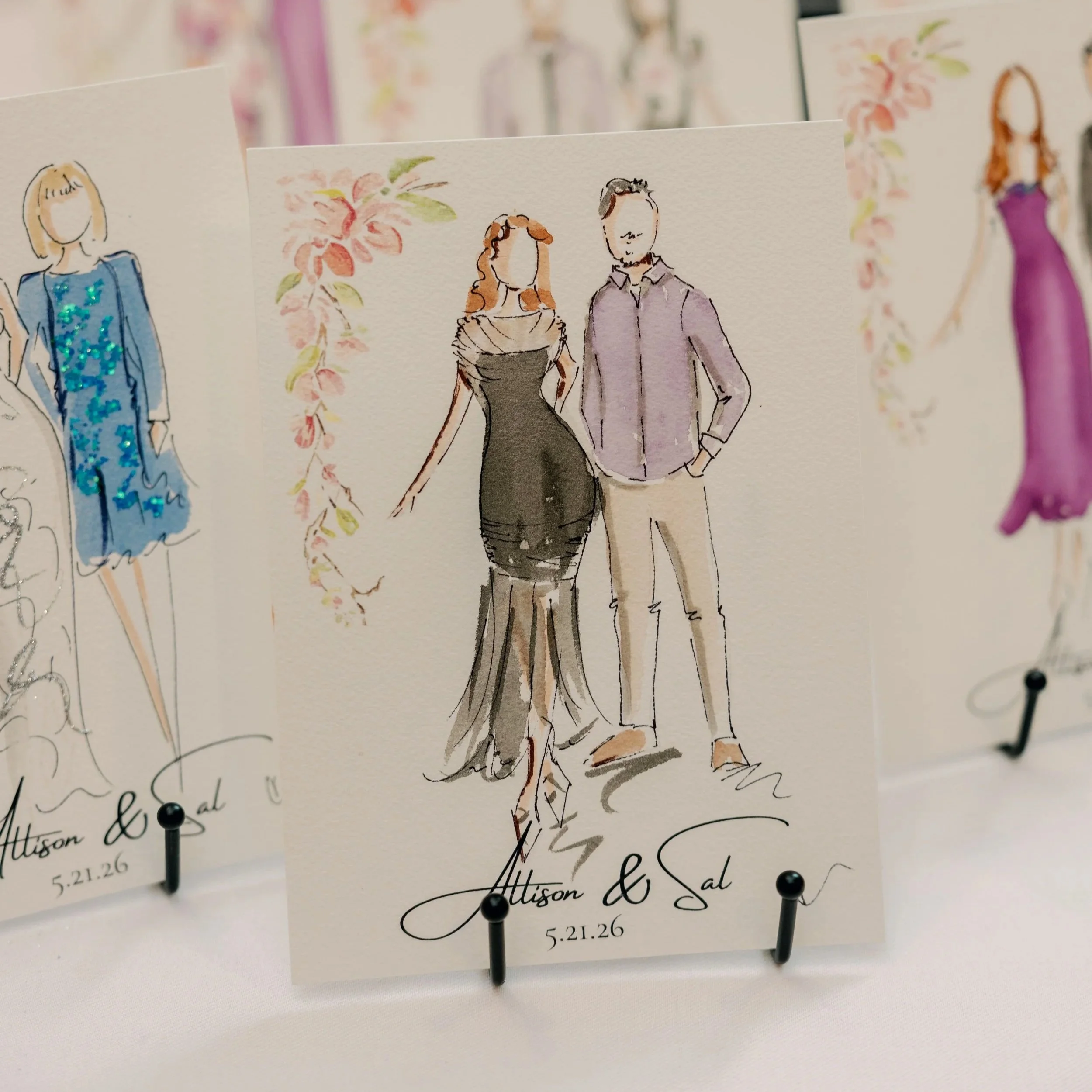 watercolor painting of guests at a black tie event painted live by our team