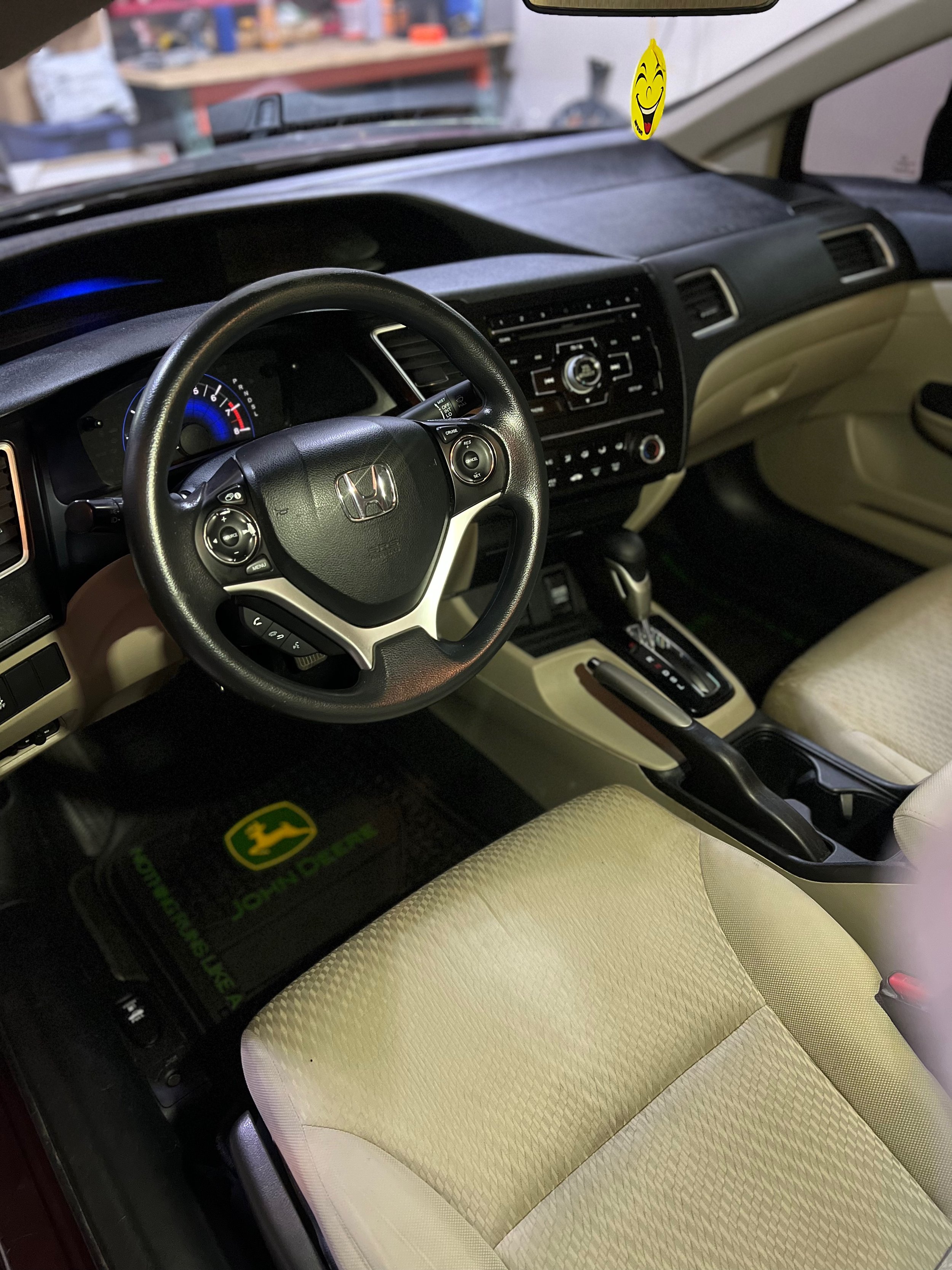 Comprehensive interior detailing showcasing cleaned carpets and dashboard.