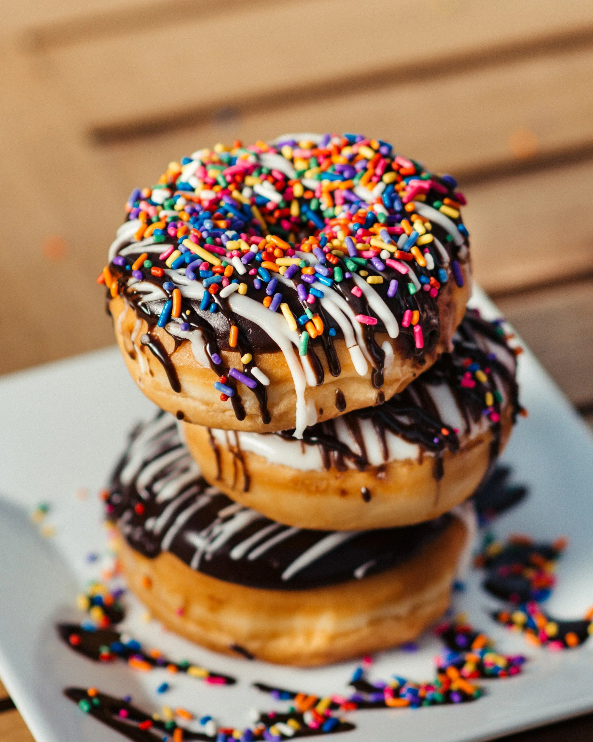 Donuts stacked on a plate, an article about delicious food