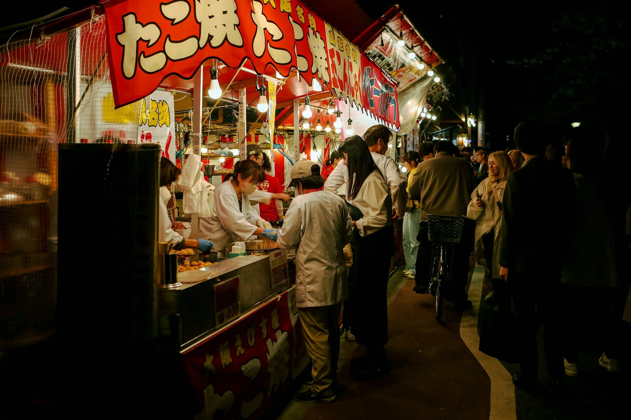 Japanese food stand selling food at a festival