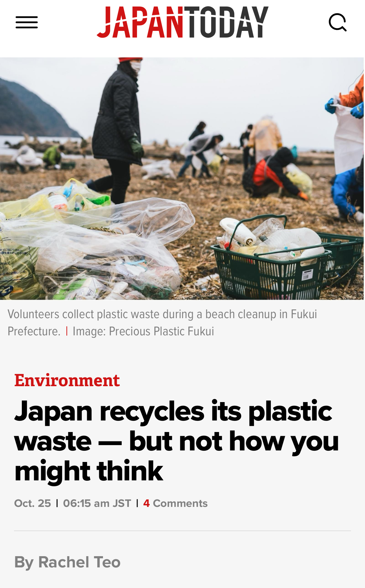 Volunteers collect plastic waste during a beach cleanup in Fukui Prefecture, Japan