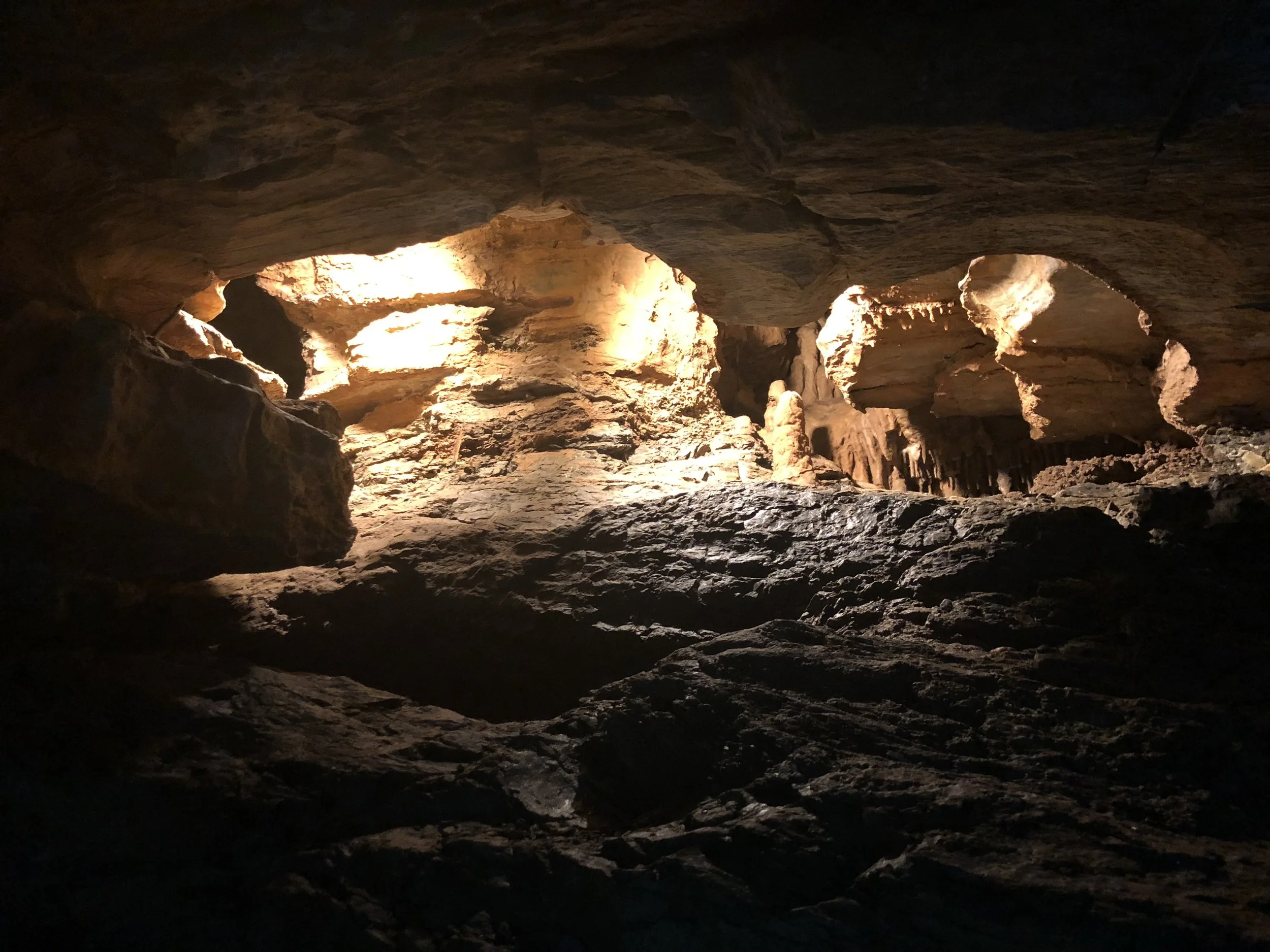 Cave structures lit up by spotlights to show its unique shape