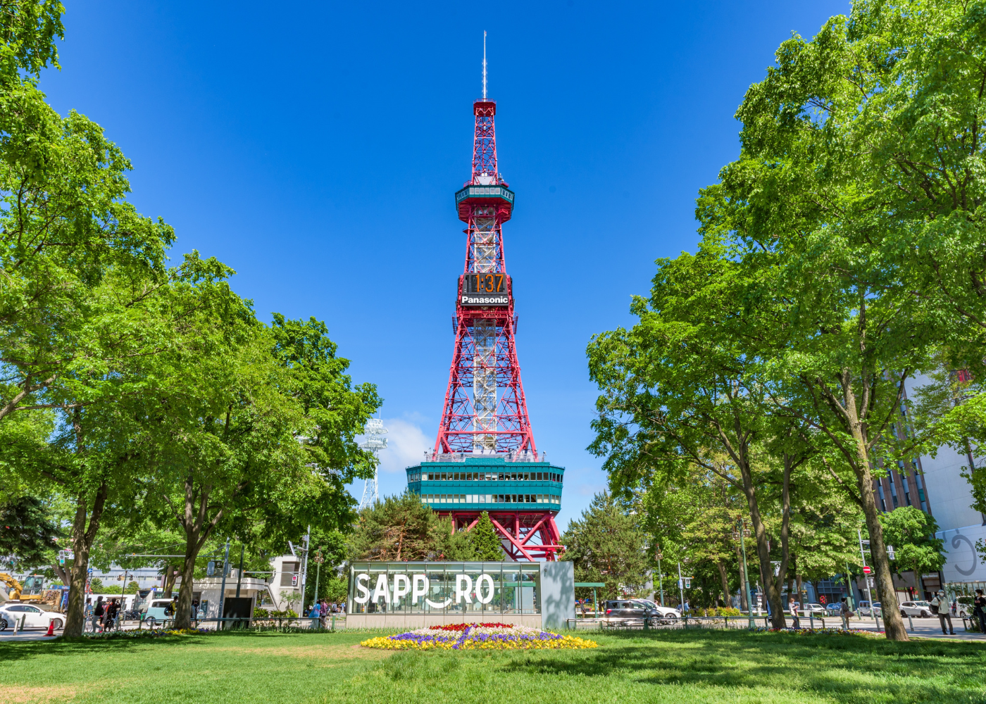 A TV tower situated in a park in Sapporo