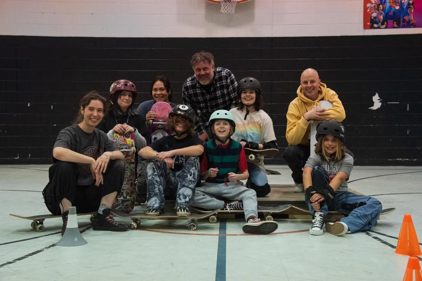 Ollie North directors and youth posing for a group photo