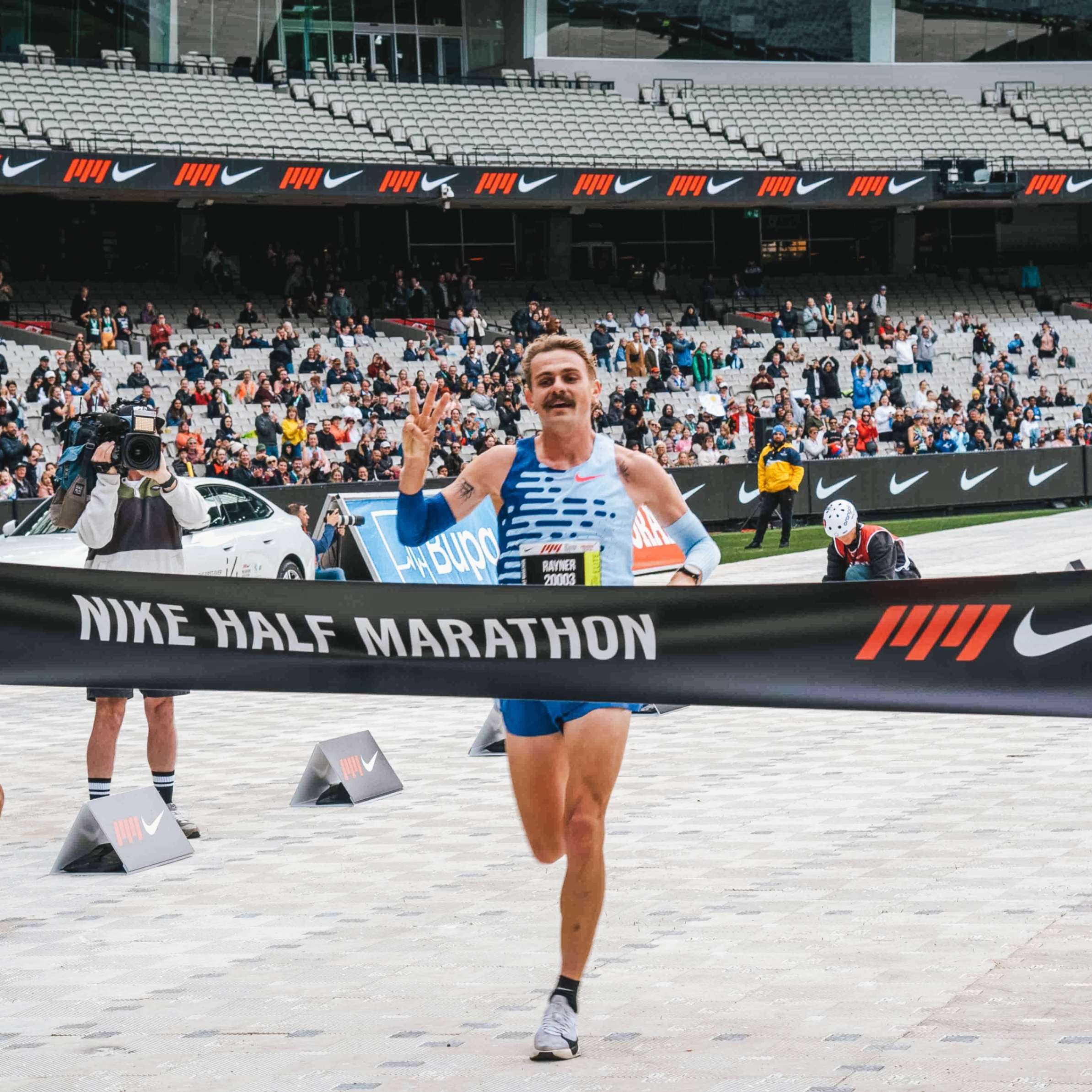 melbmara-runner-crossing-finish-line.jpg