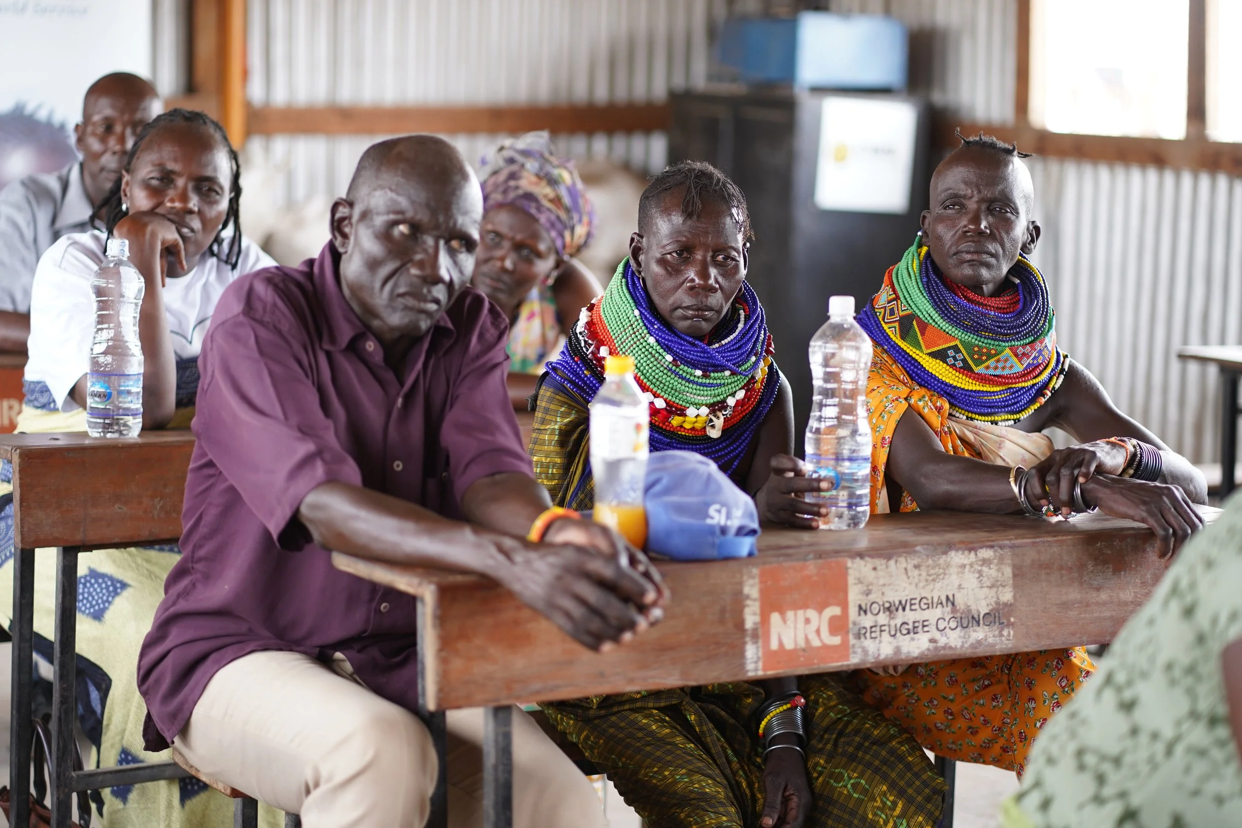 Community members of kakuma refugee camp at a meeting