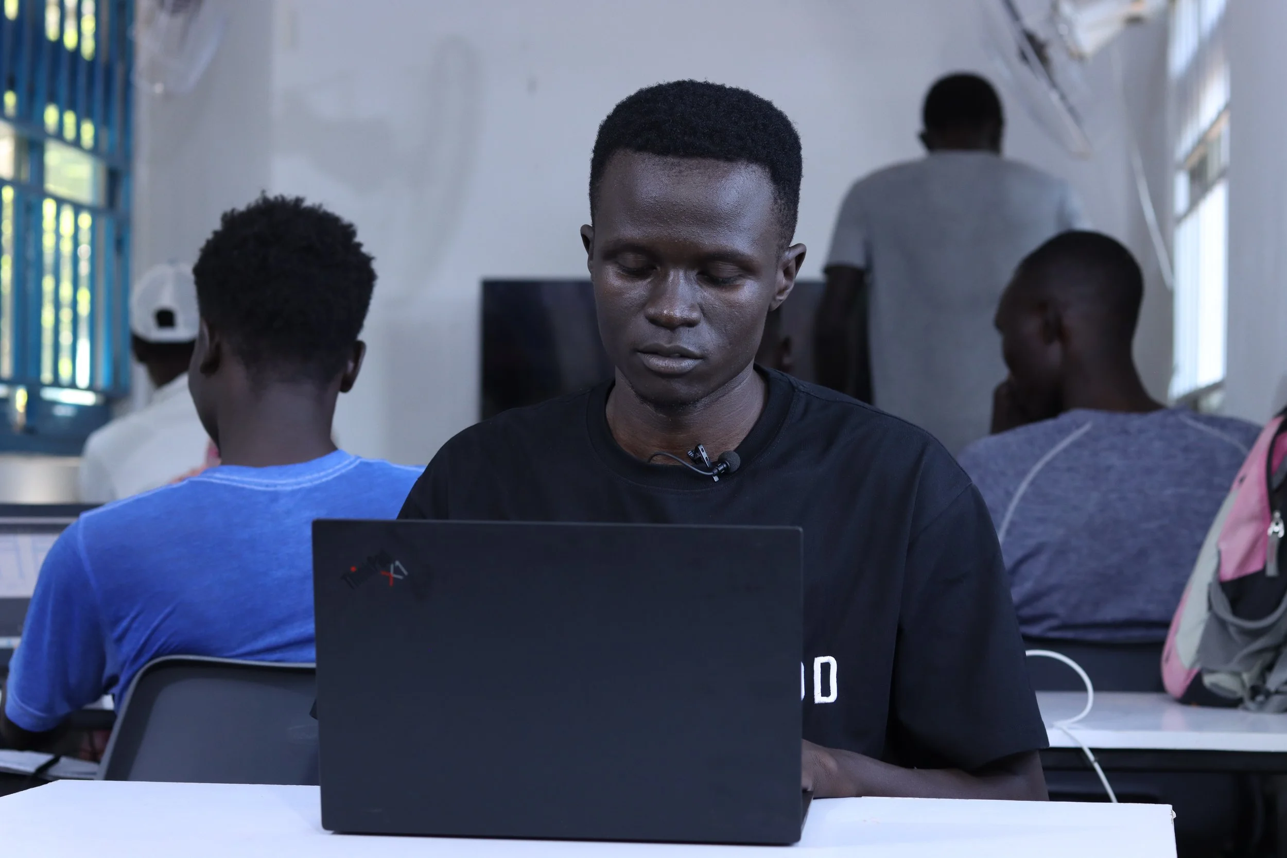 3d modelling student from the creative gateway looking at their computer screen